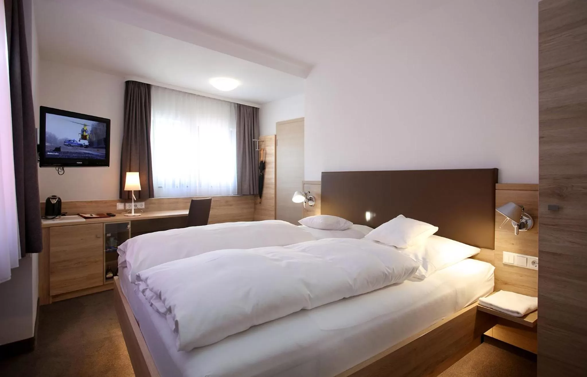 Photo of the whole room, Bed in Hotel Warteck