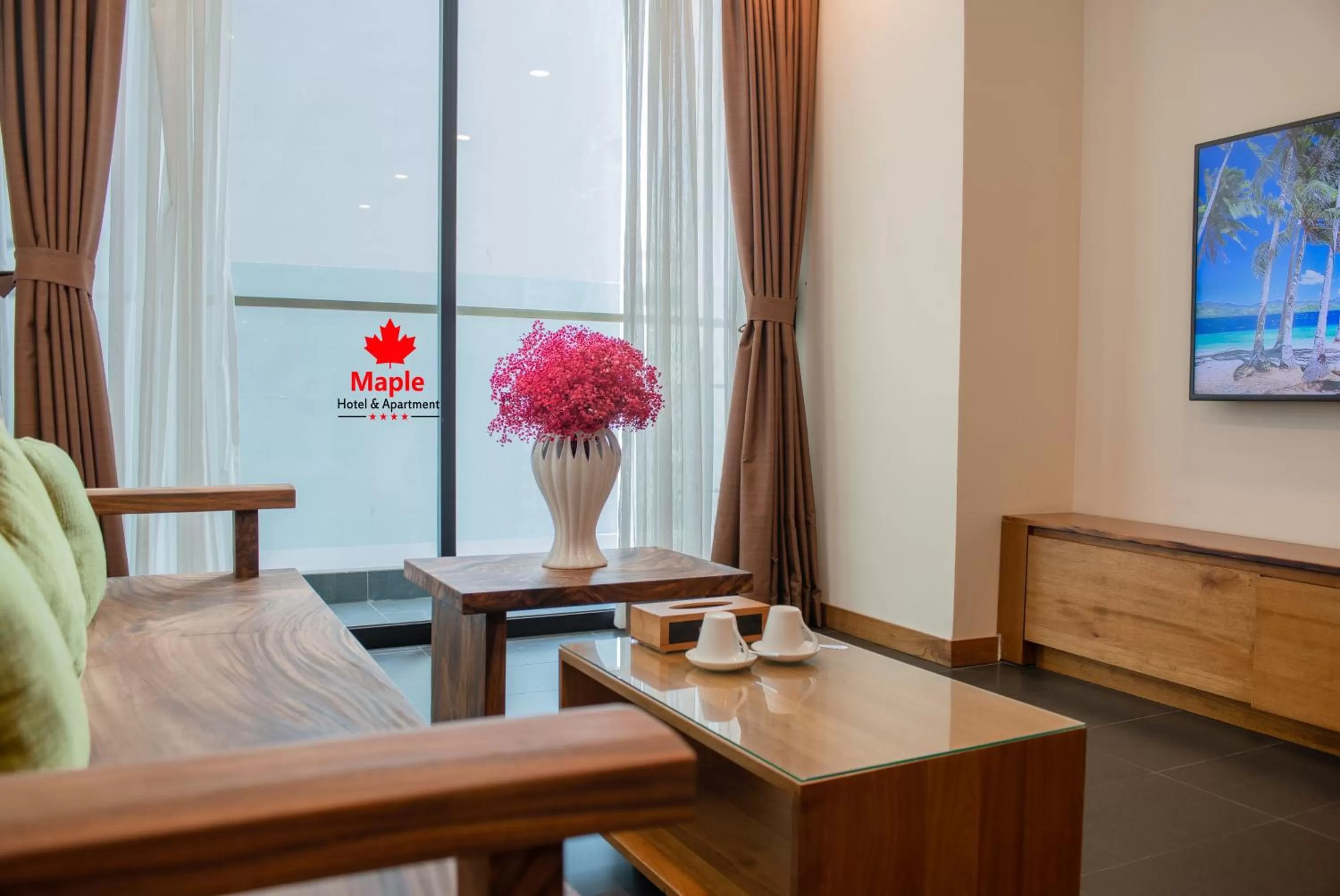 TV and multimedia in Maple Hotel & Apartment