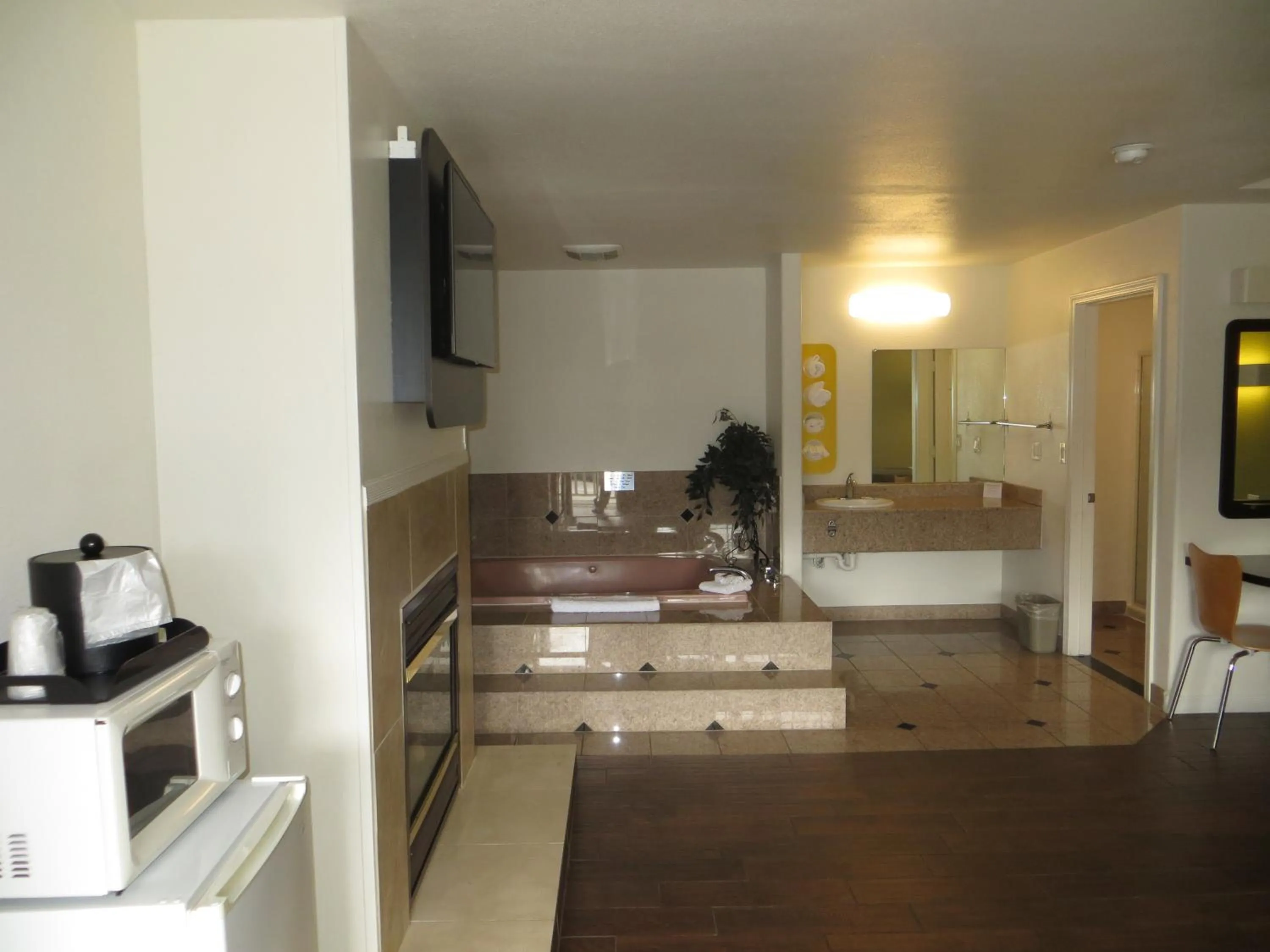 Photo of the whole room, Kitchen/Kitchenette in Motel 6 - Downtown Monterey
