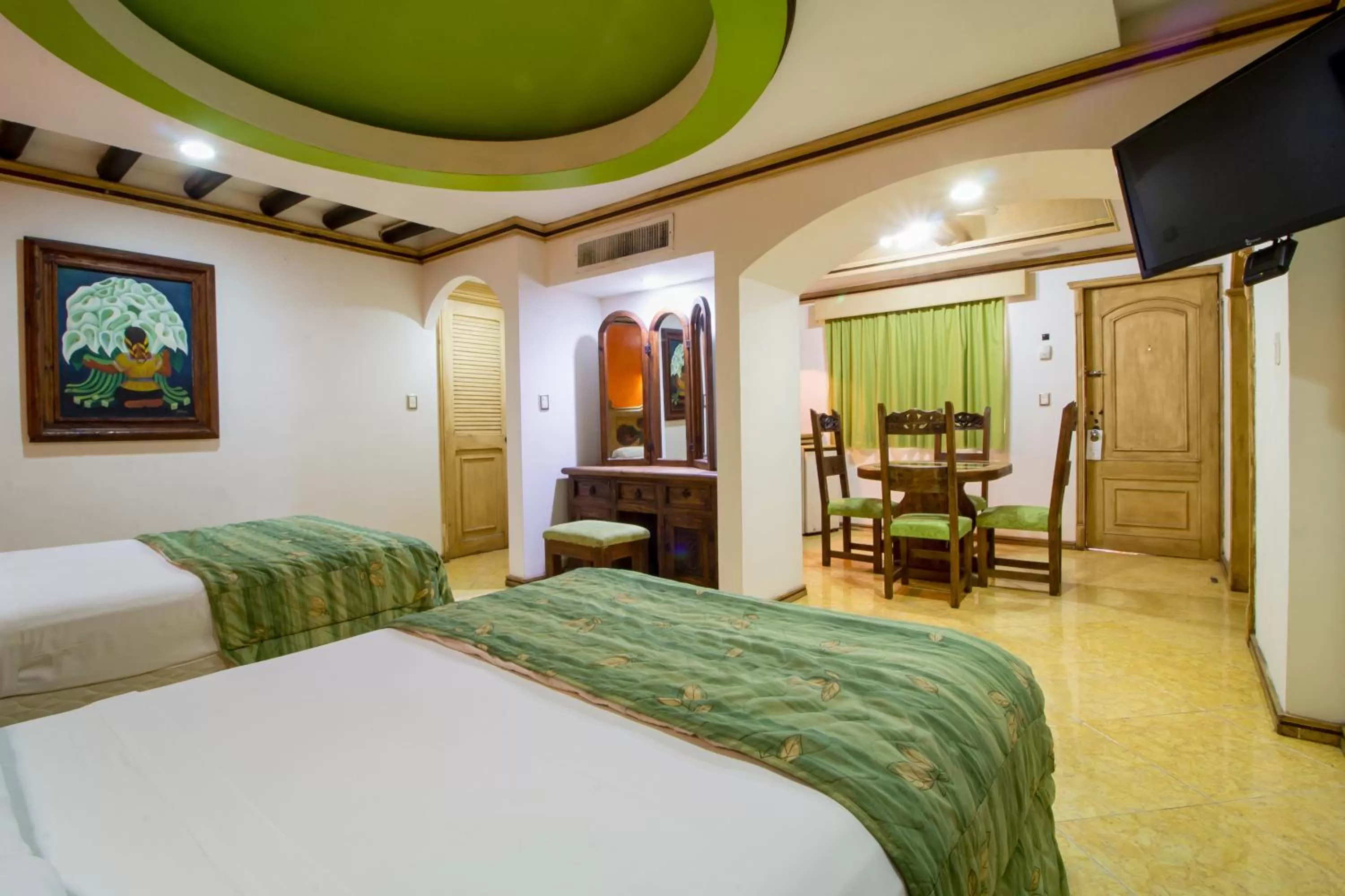 Photo of the whole room, Bed in Suites Flamboyanes