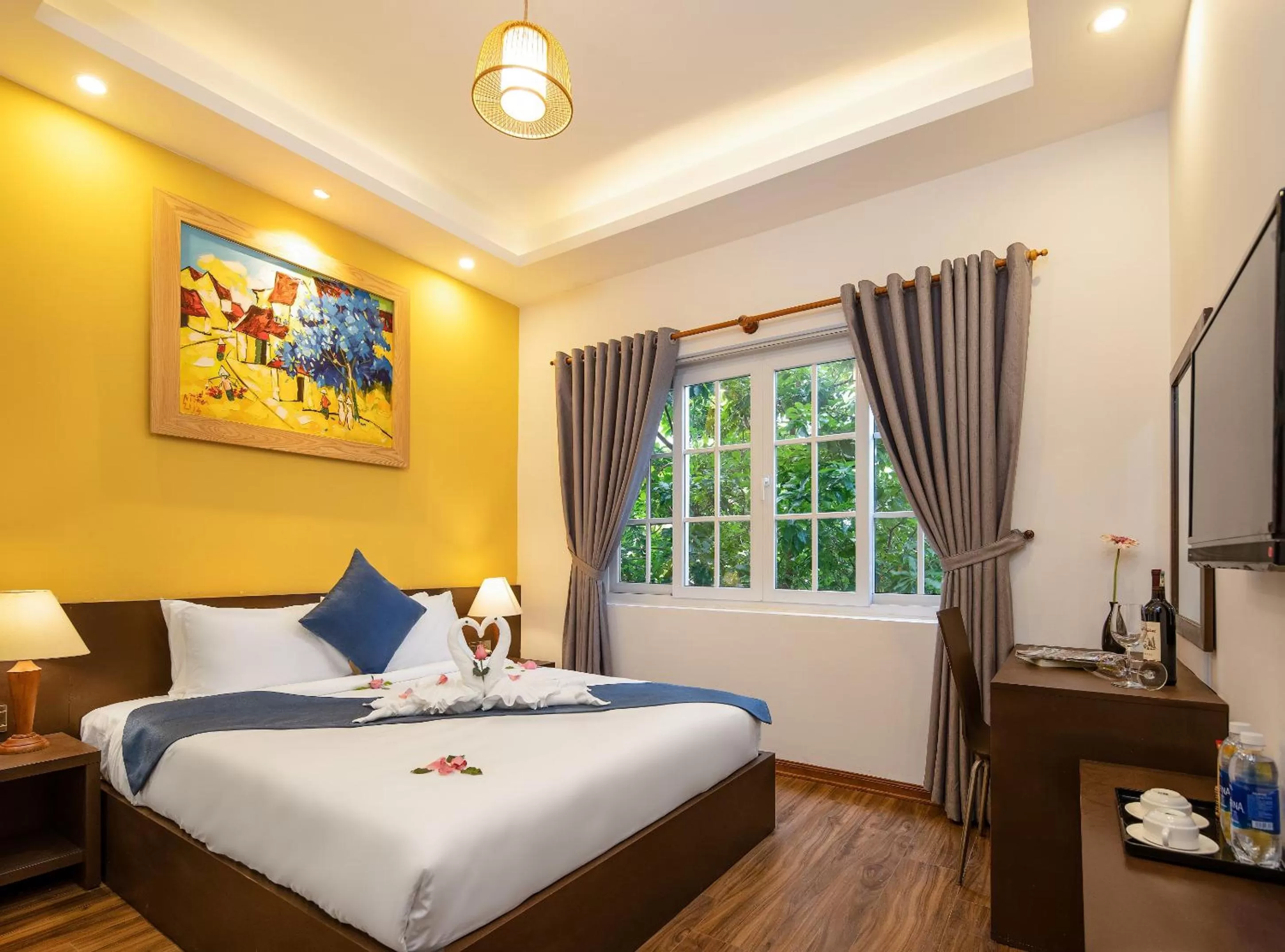 Photo of the whole room, Bed in TRIPLE Riverside Villa Hotel HoiAn