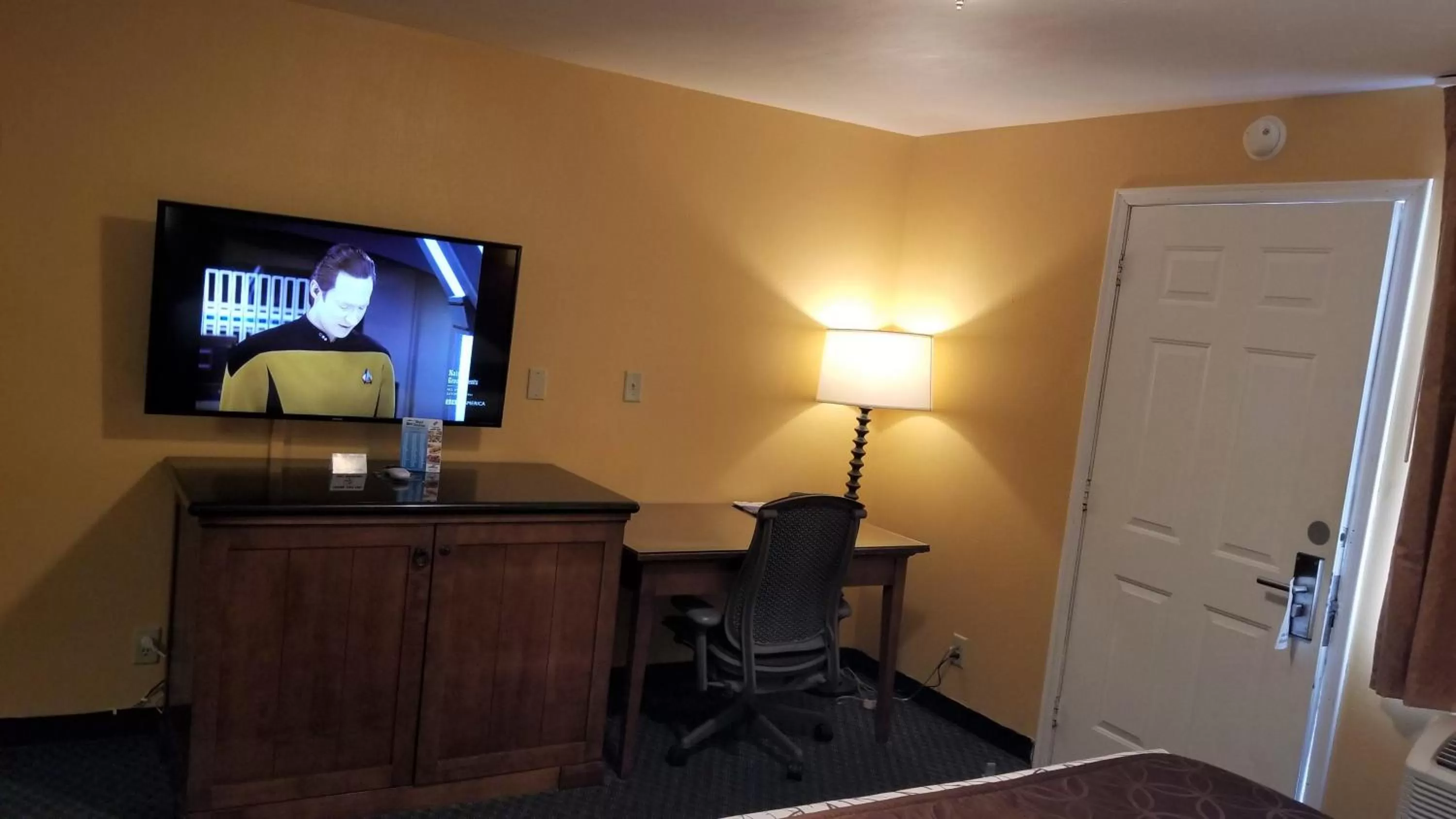Bedroom in The Royal Victorian Motel