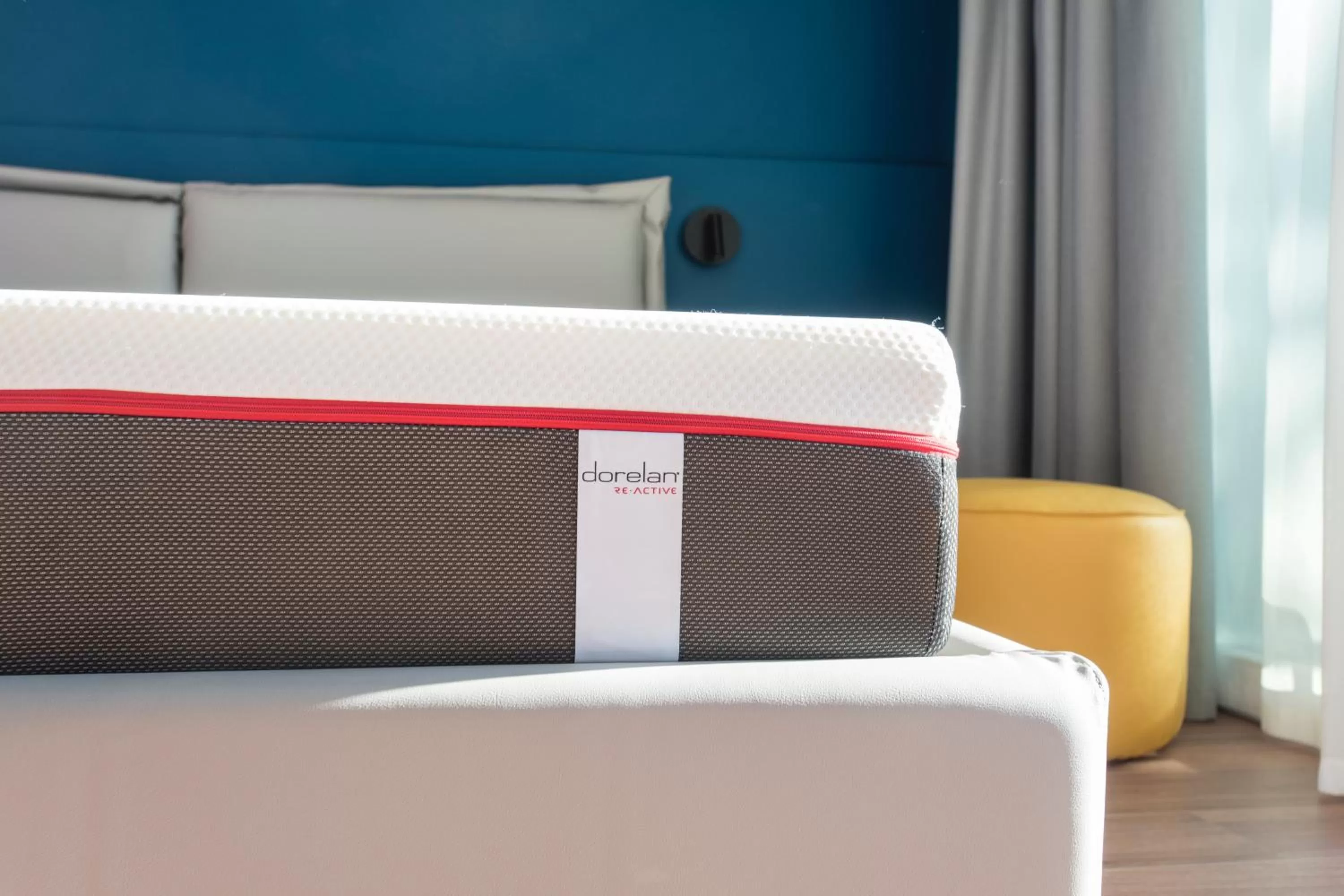 Bed in HOODY ACTIVE & HAPPINESS HOTEL