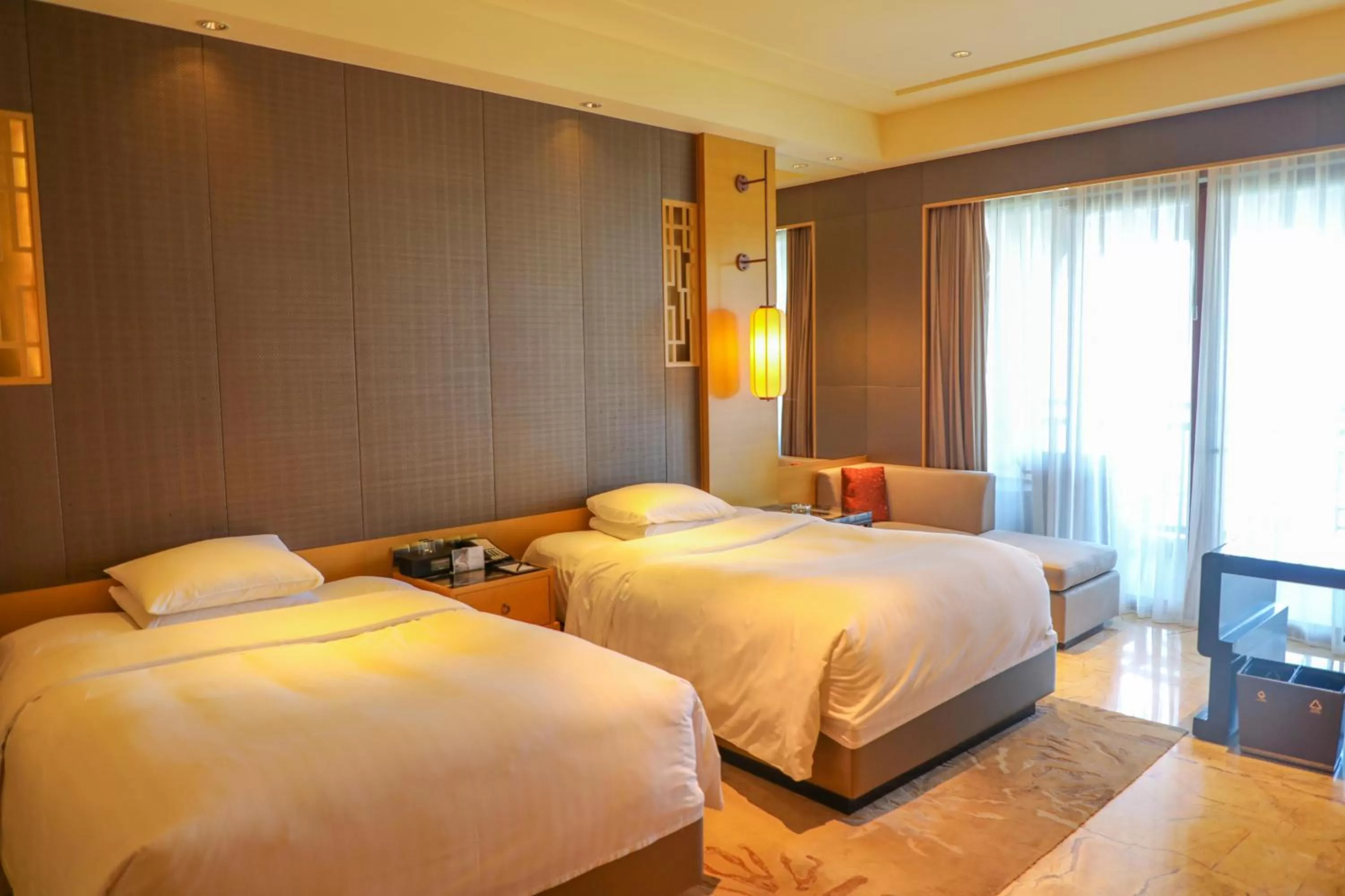 Bed in Haikou Marriott Hotel