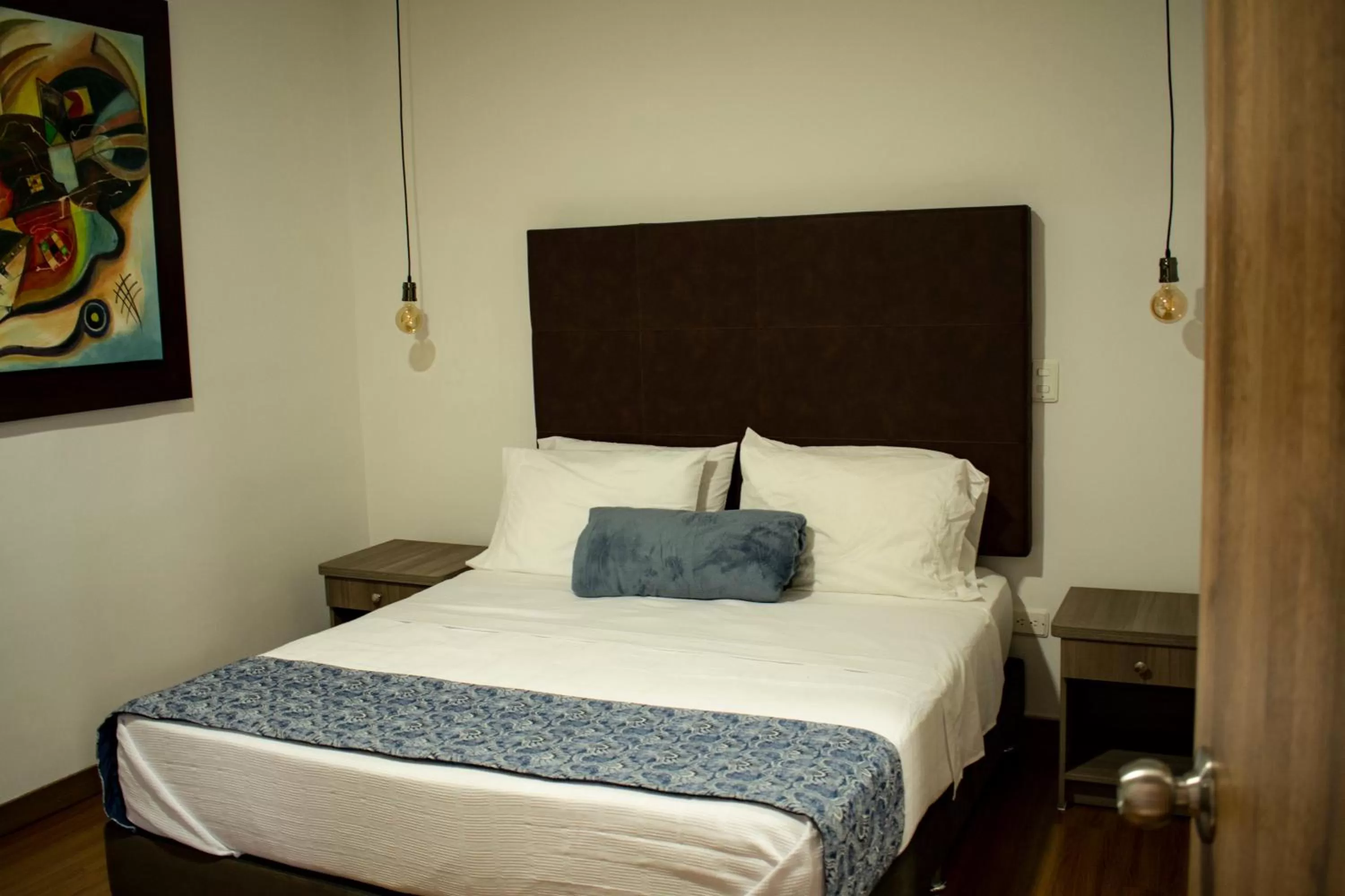 Bed in El Reloj Casa Hotel