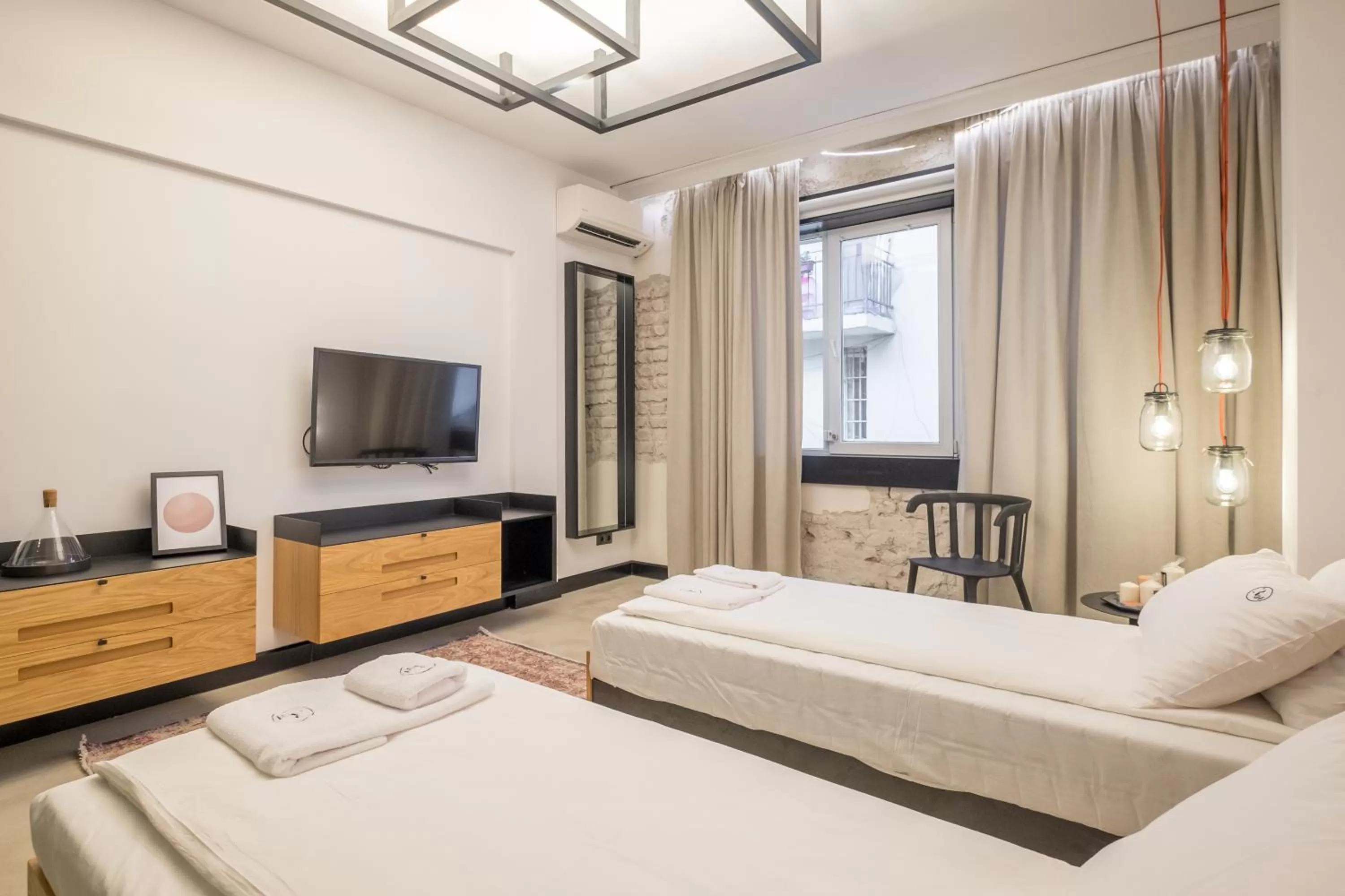 Bed in R34 Boutique Hotel