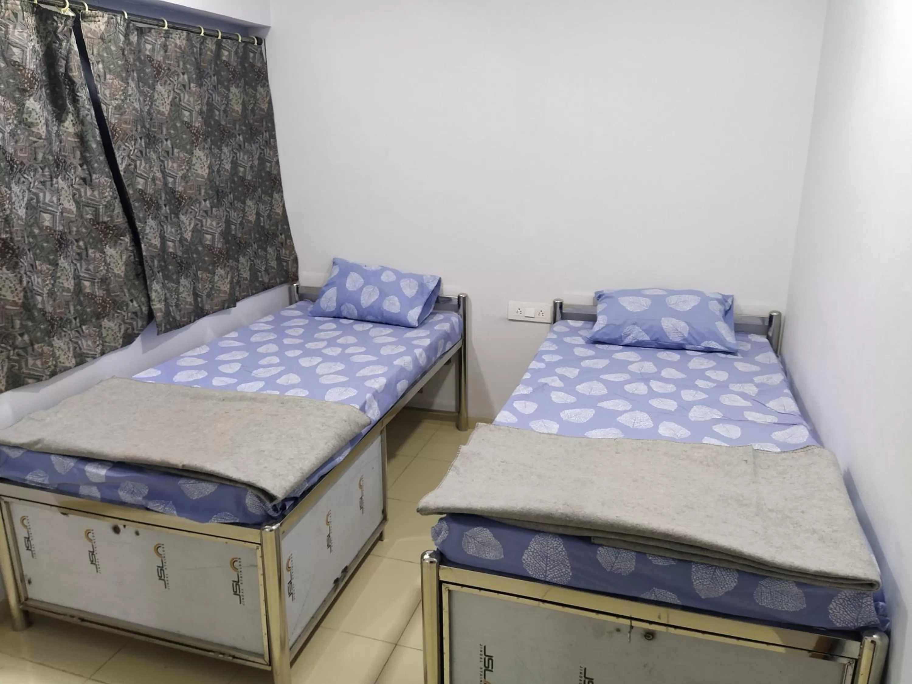 Bed in Shiv Sai Dormitory