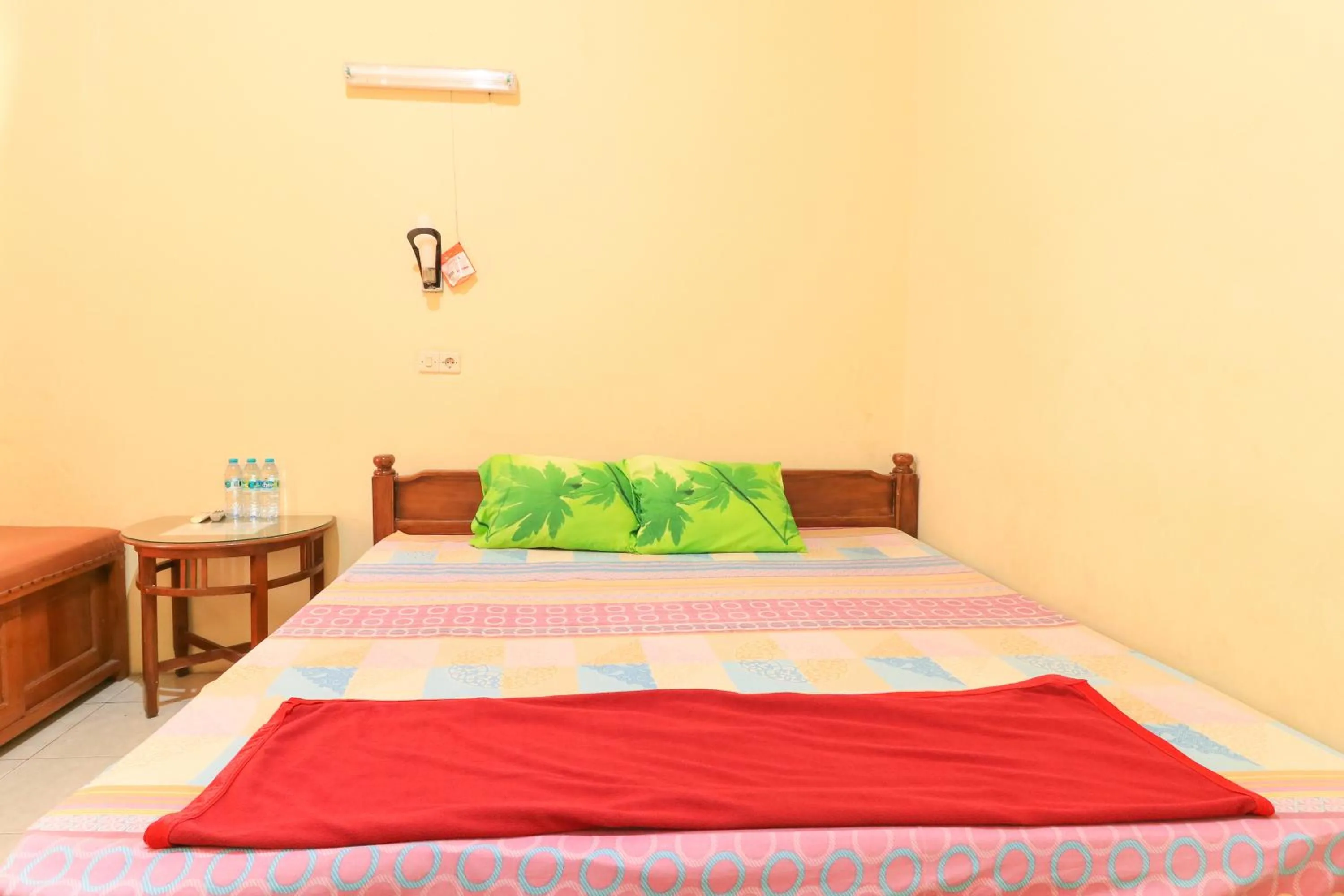 Bed in Penginapan Pondok Rizqi Syariah