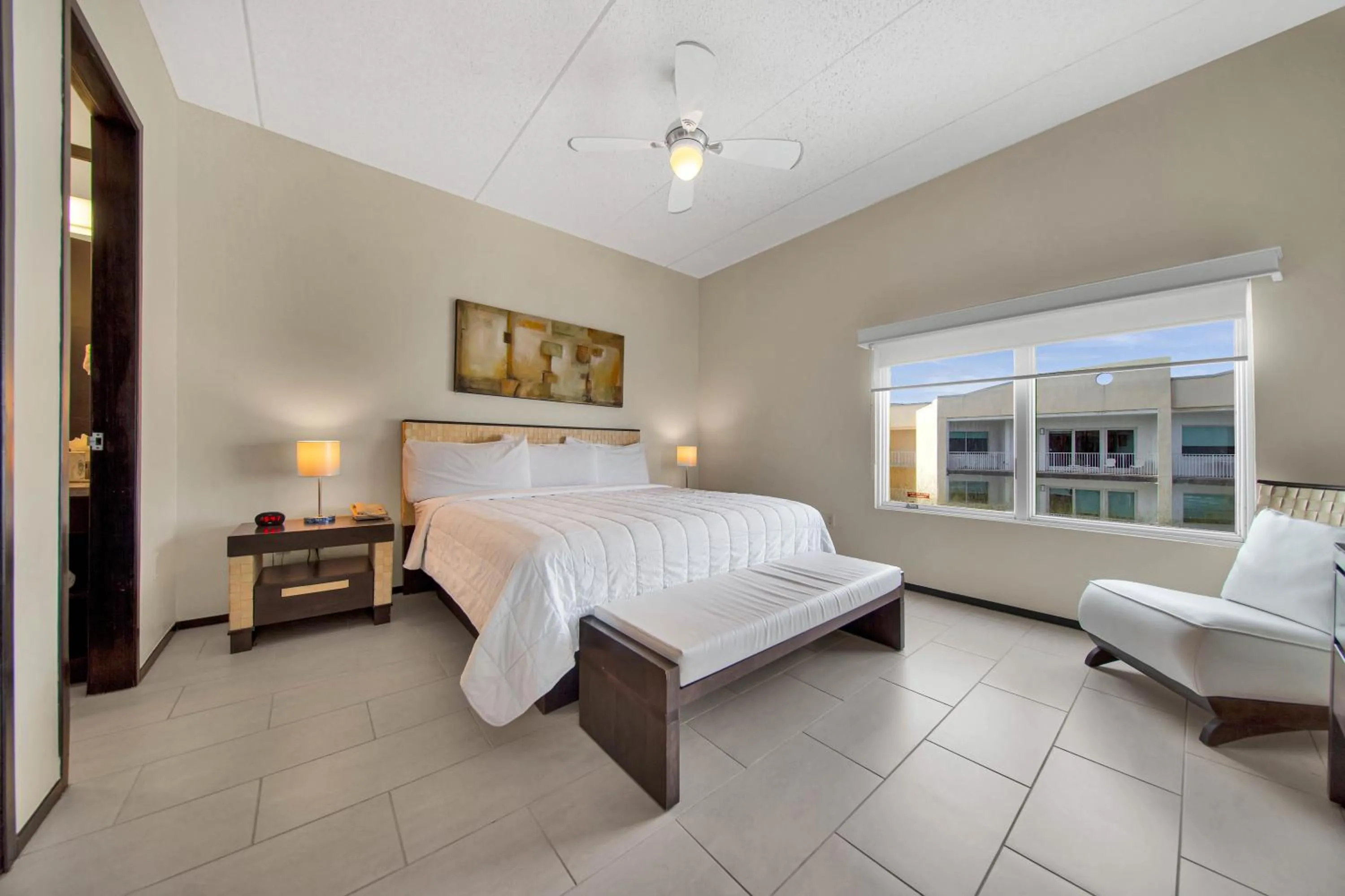 Photo of the whole room, Bed in Peninsula Island Resort & Spa - Beachfront Property at South Padre Island