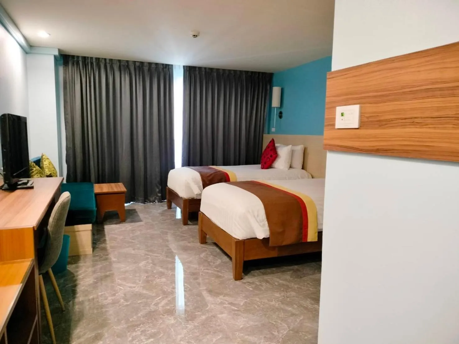 Bed in Saisawan Beach Luxury Hotel