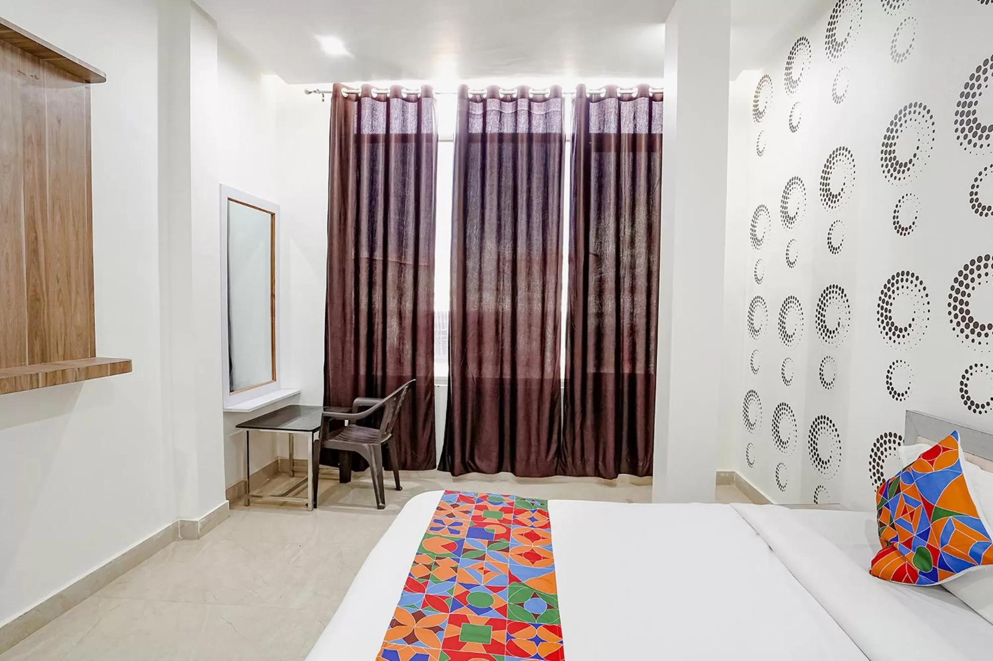 Bed in FabHotel Siddhi