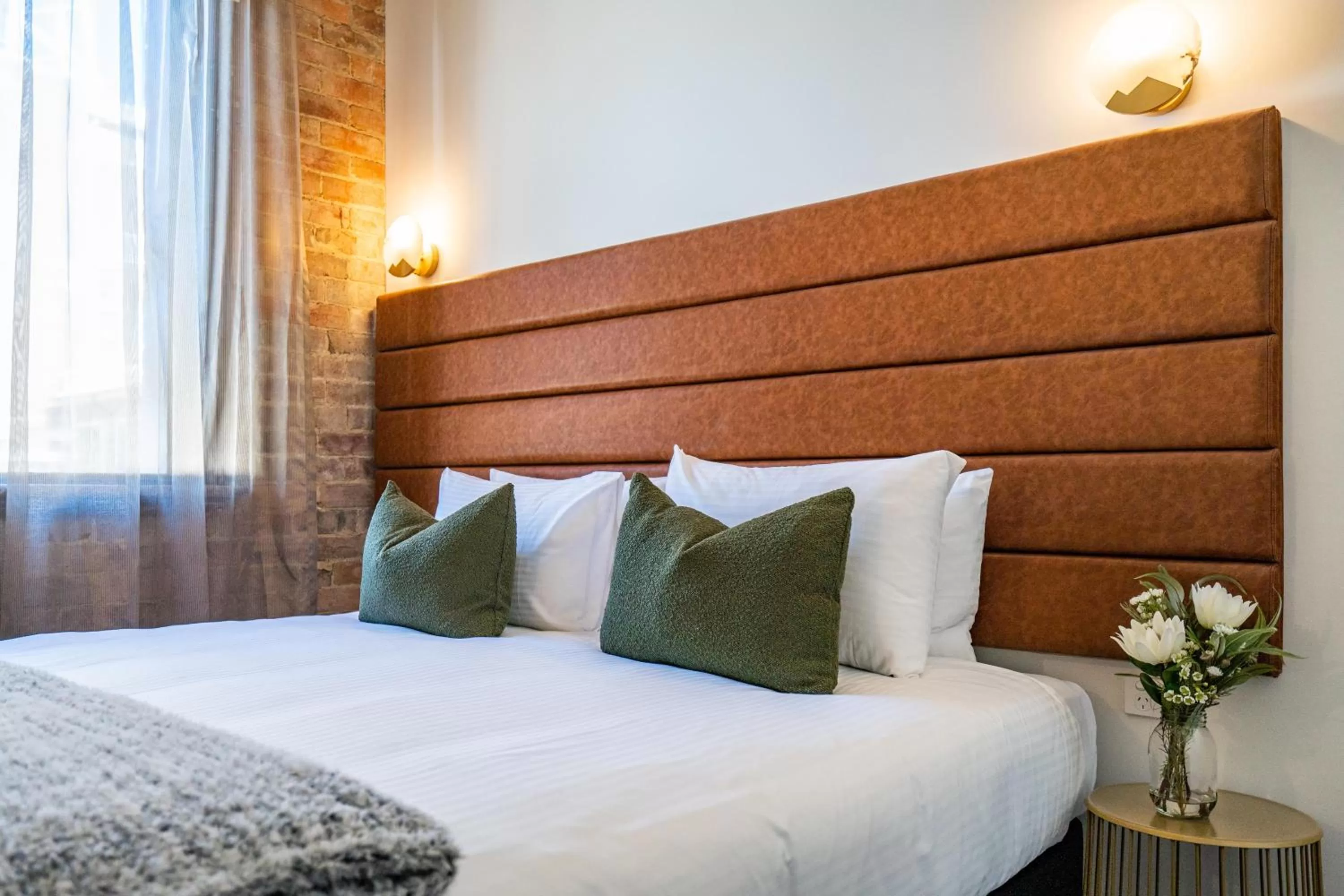 Bed in Grand Hotel and Studios