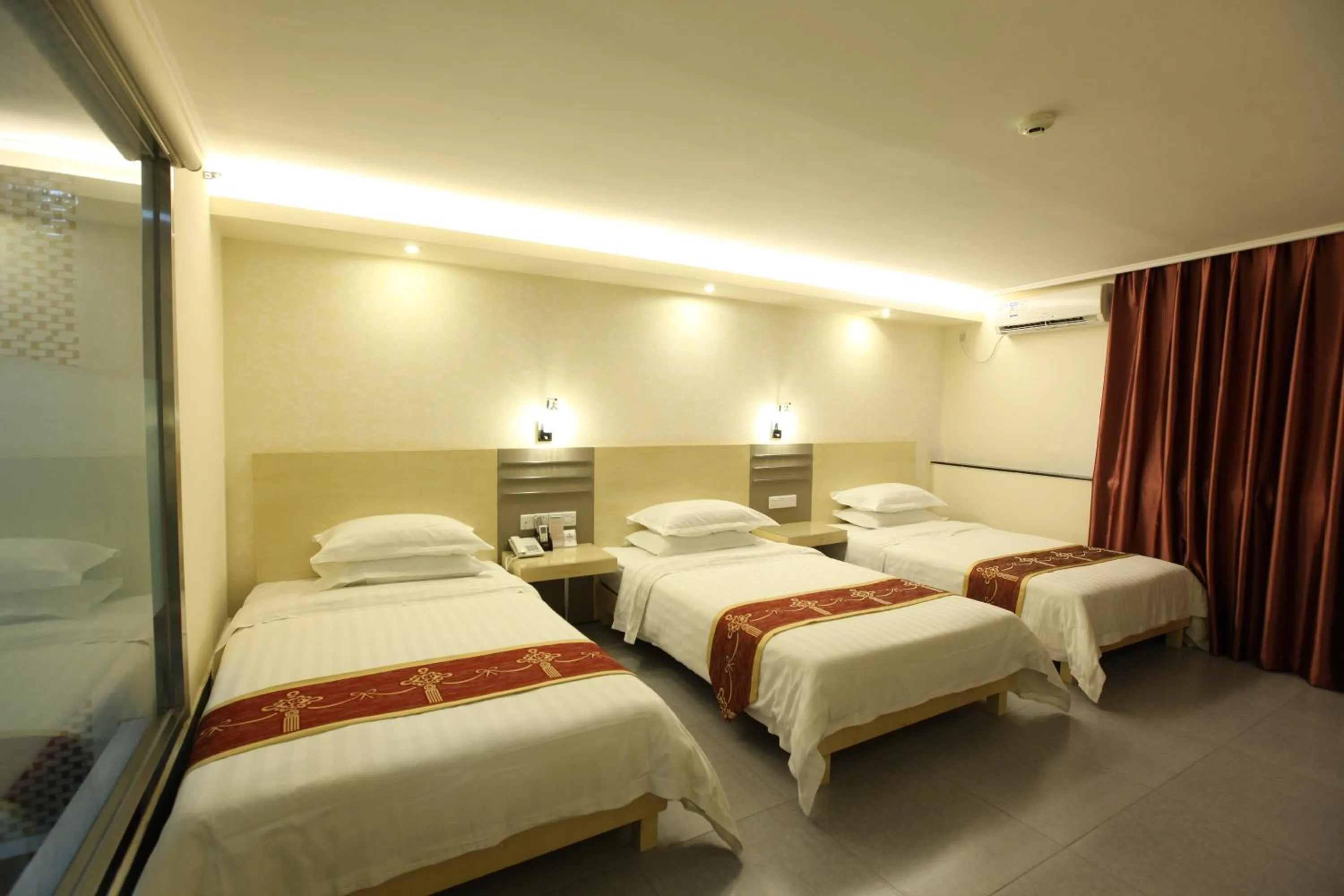 Bed in Guang Dong Hotel