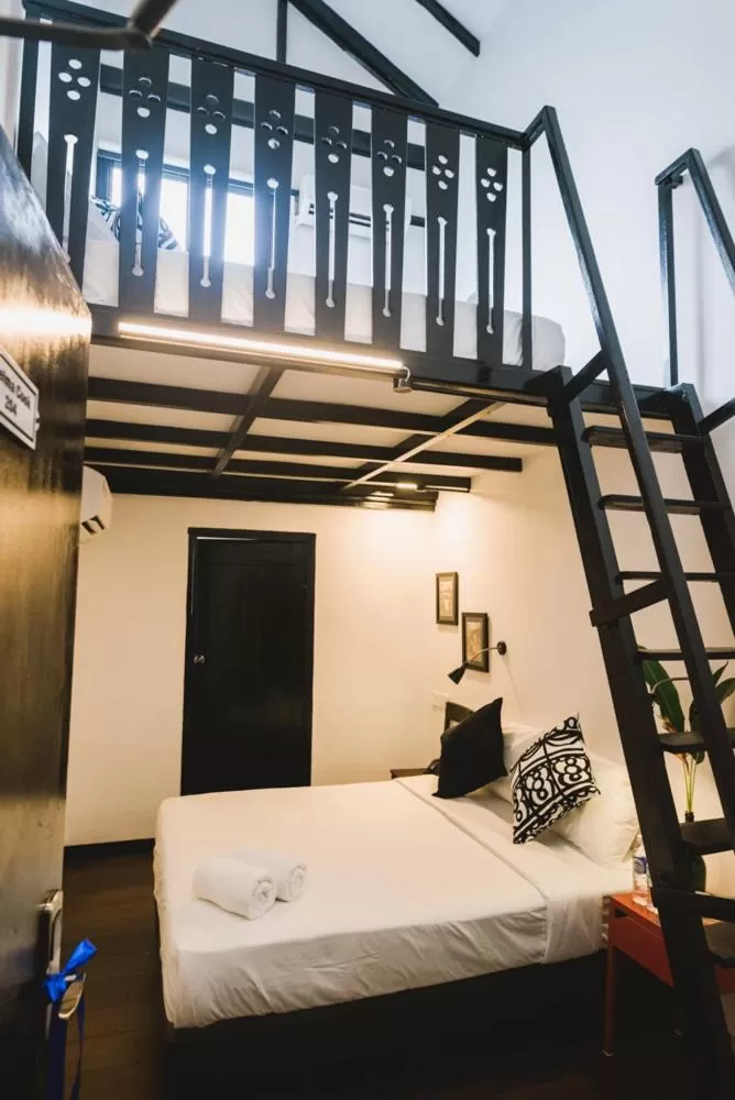 Bed in The Marian Boutique Lodging House