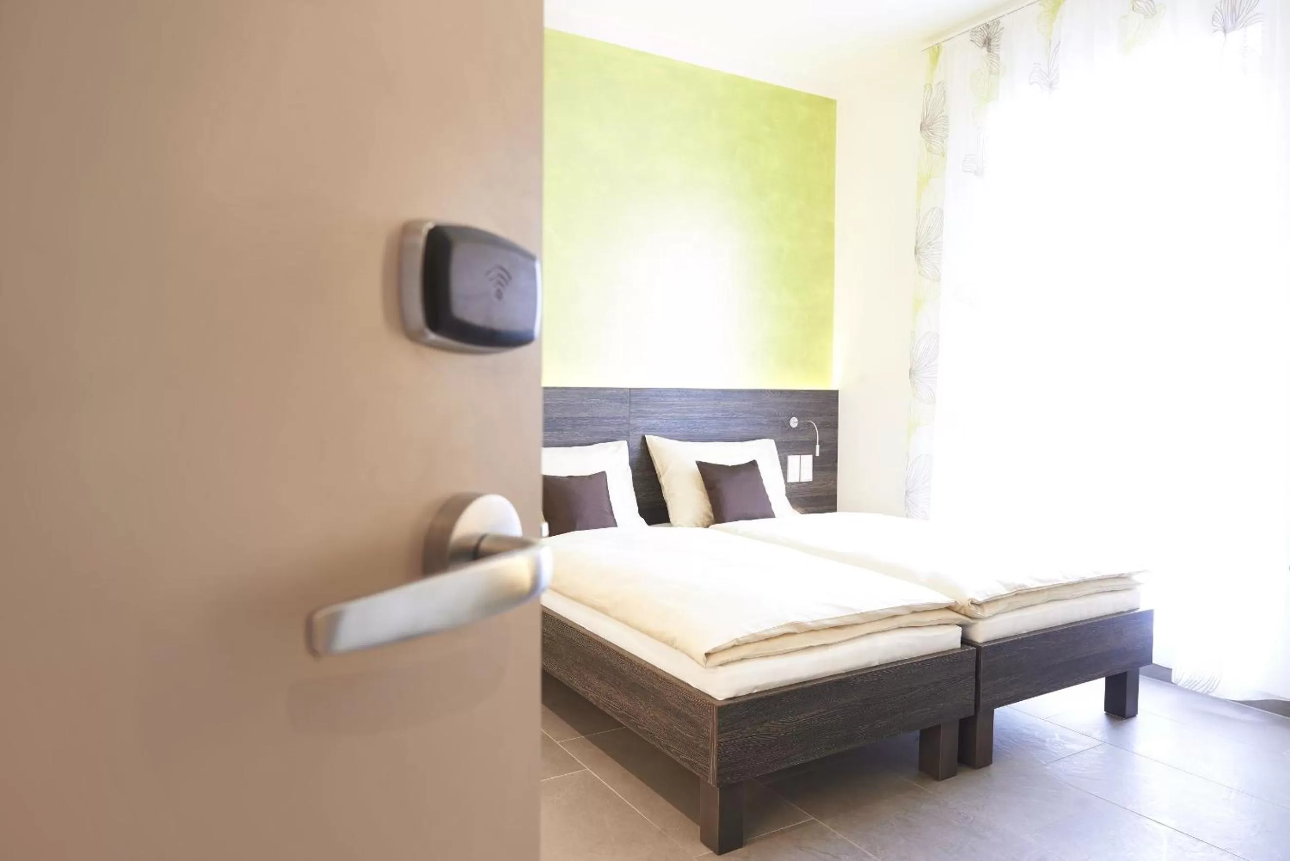 Bed in eee Hotel Traun