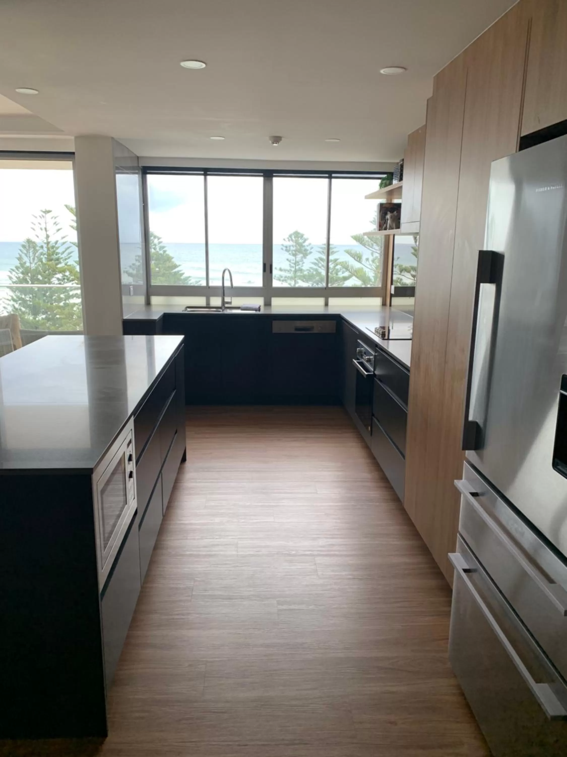 Kitchen or kitchenette in Pacific Regis Beachfront Holiday Apartments