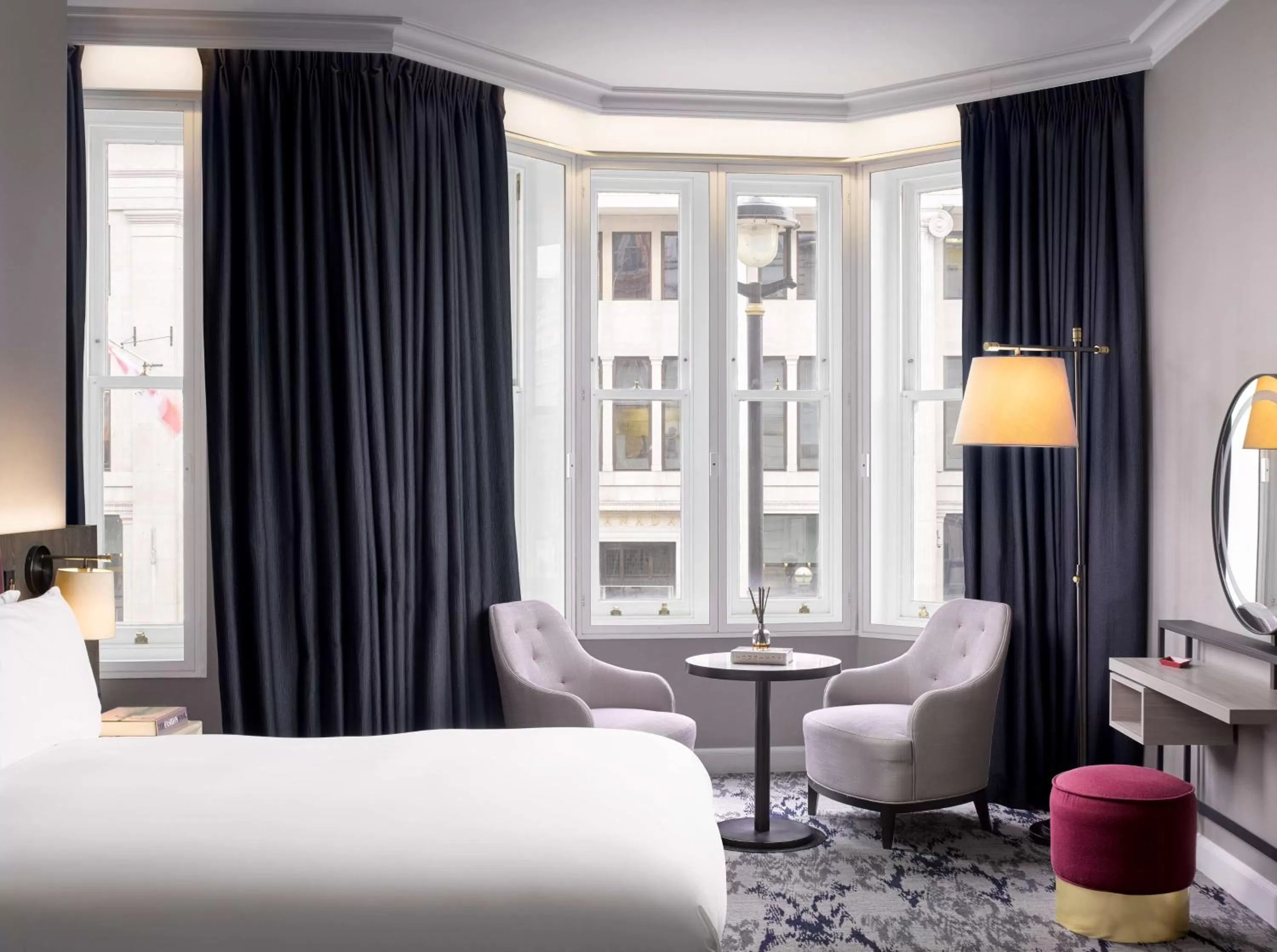 Living room, Bed in The Trafalgar St. James, London Curio collection by Hilton