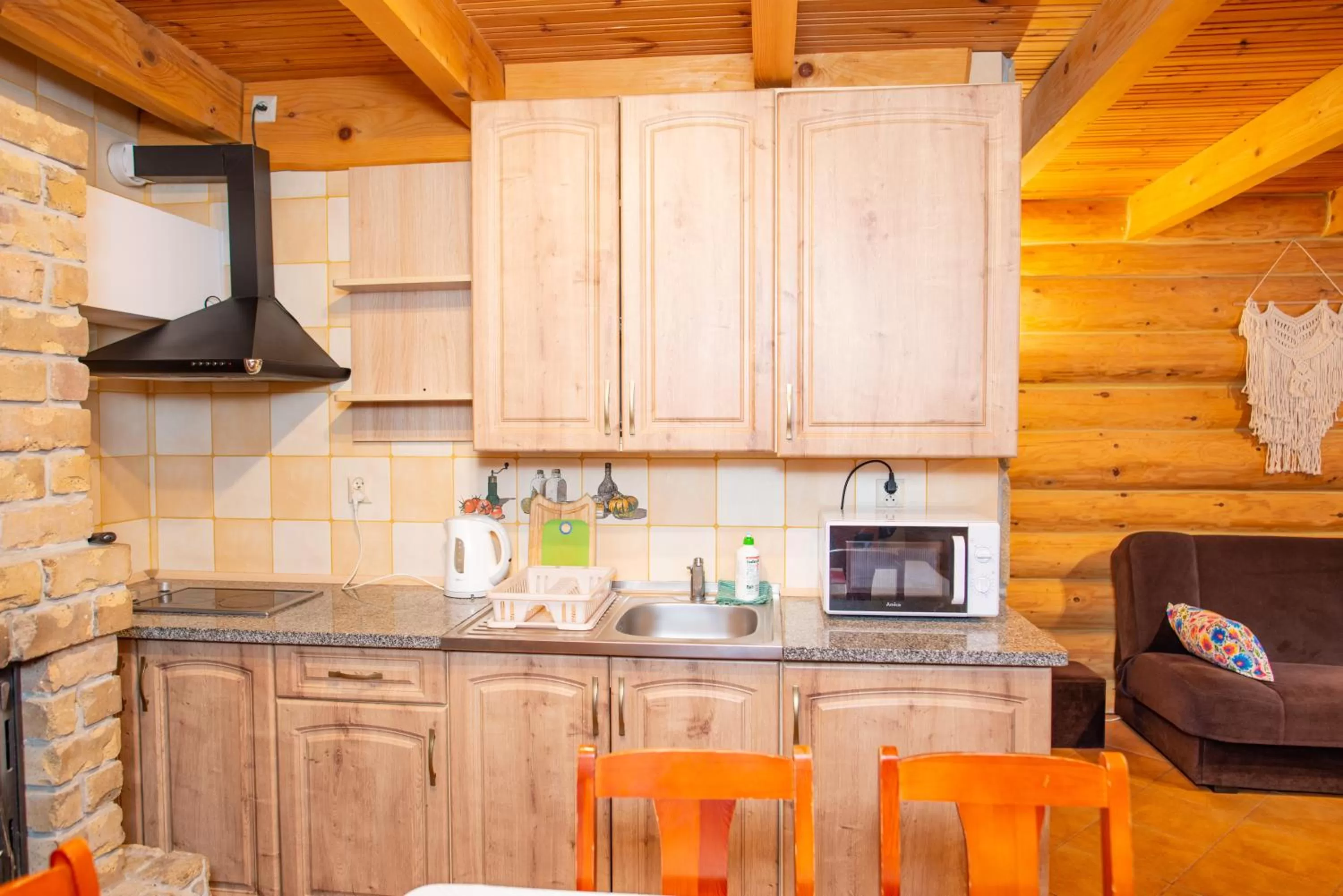 Kitchen or kitchenette in Gościniec Pięciu Stawów