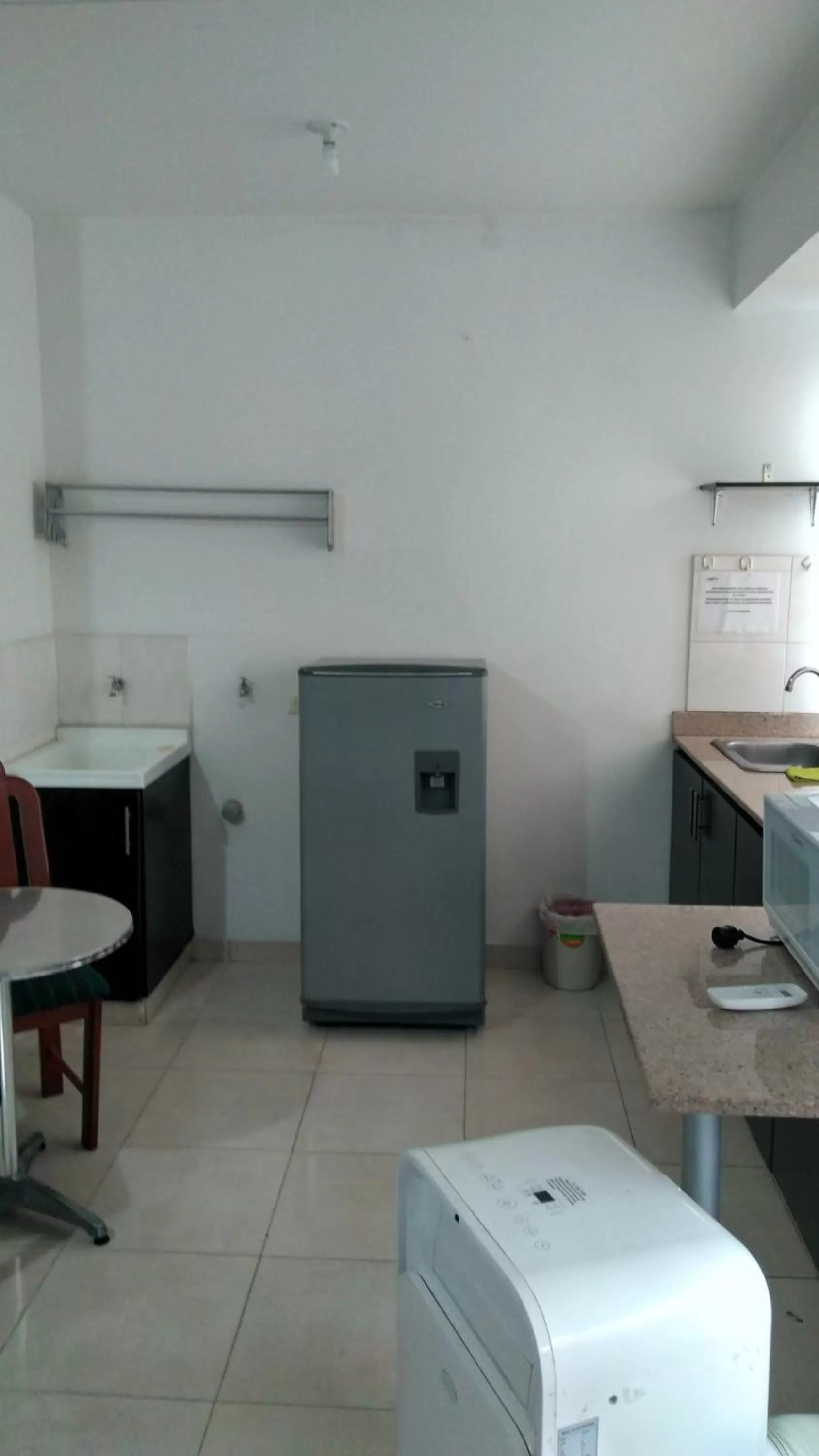 Kitchen or kitchenette in Arco Apartasuites