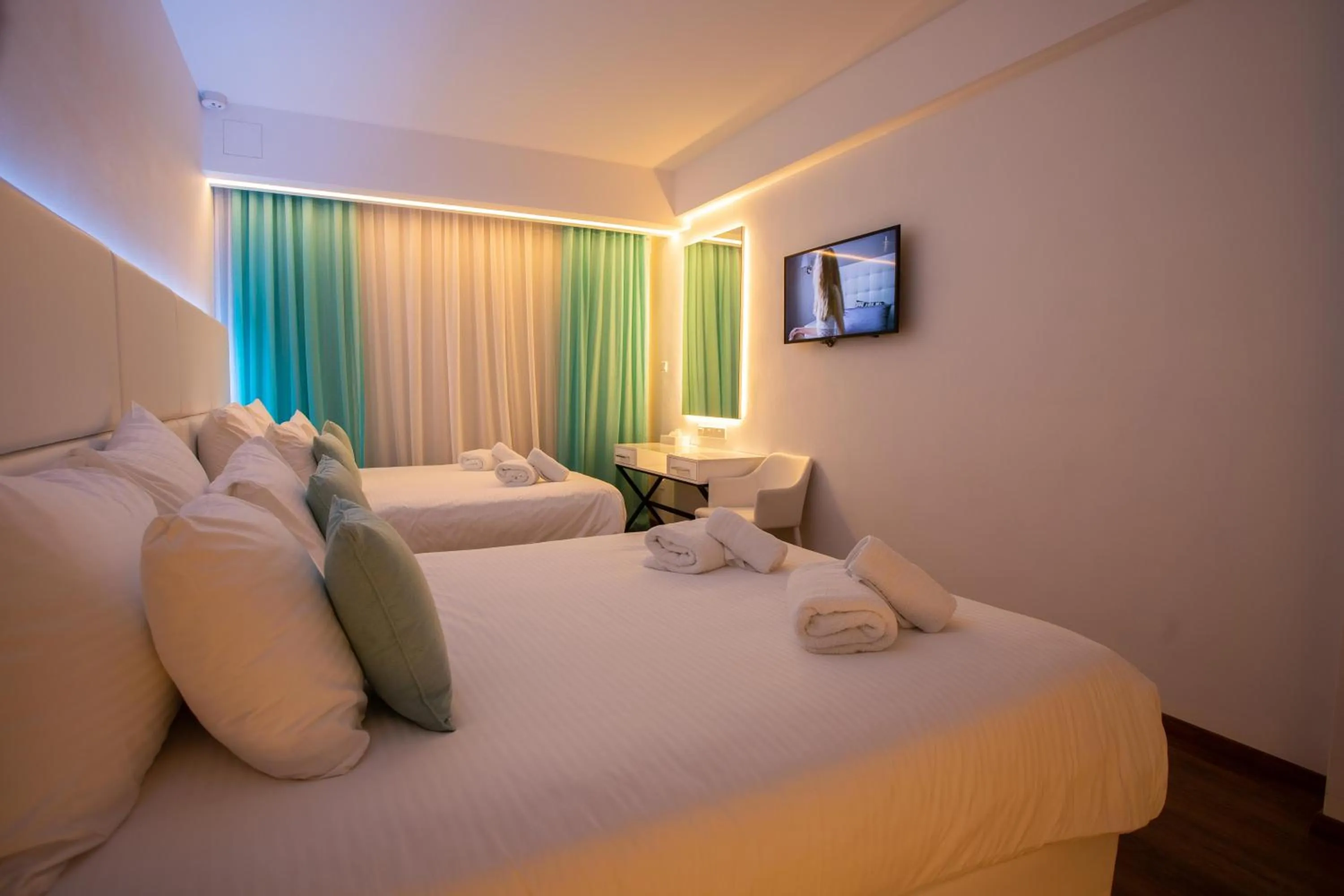 Deluxe Room with 2 Double Beds & Balcony with Side Sea View  in Hotel Napa Suites (Adults Only)