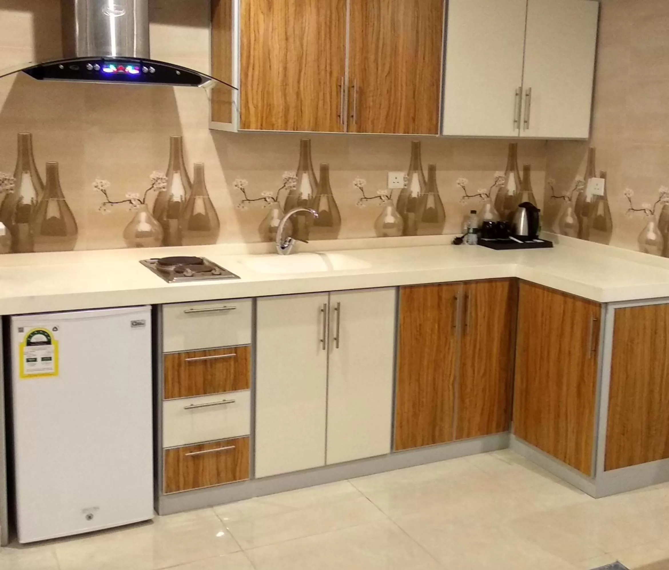 Kitchen or kitchenette in يان للشقق المخدومة - Yan Apartments