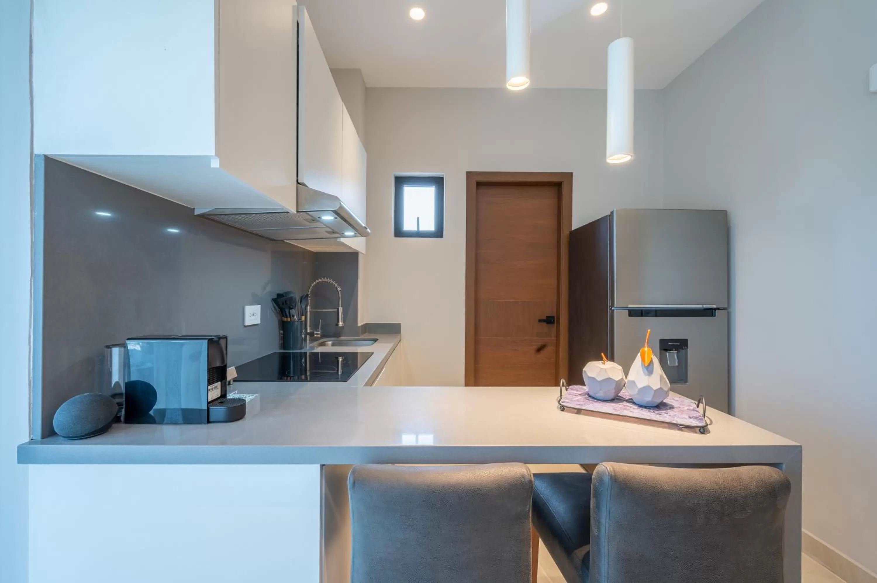 Kitchen or kitchenette in Kippal - Modern Oasis - ApartHotel