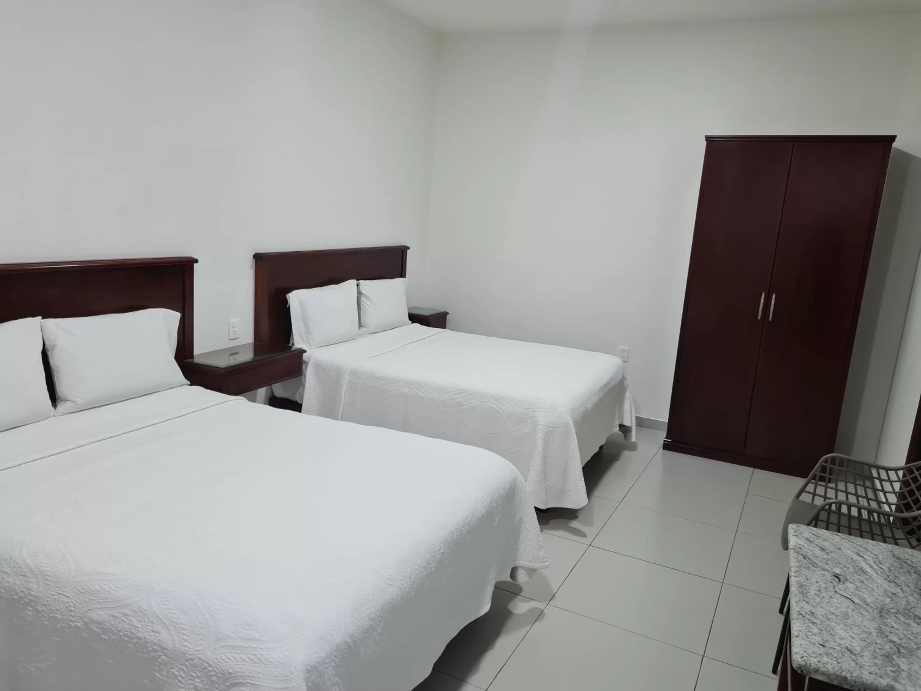 Bed in HOTEL FINA INN