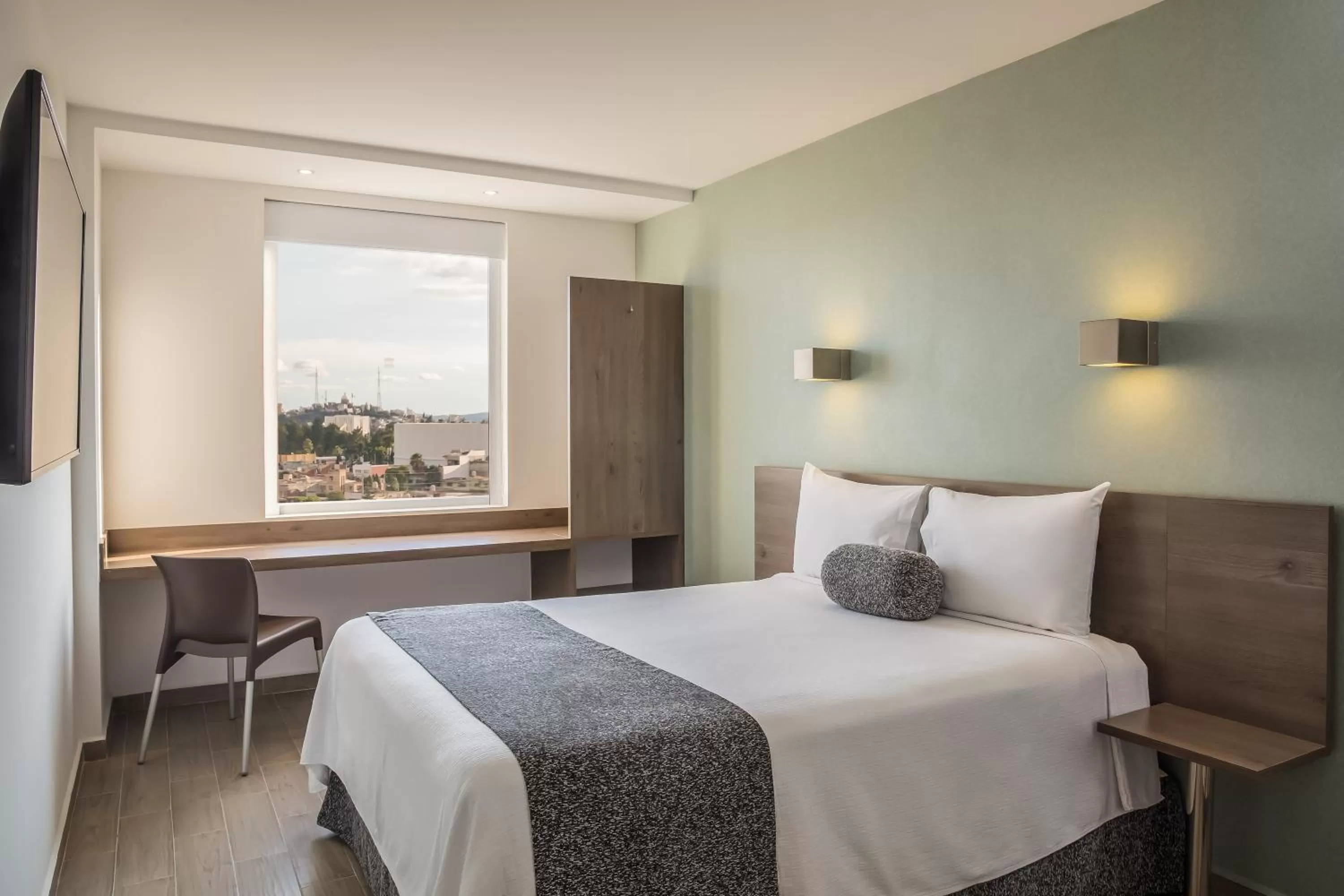 Photo of the whole room, Bed in One Puebla Serdan