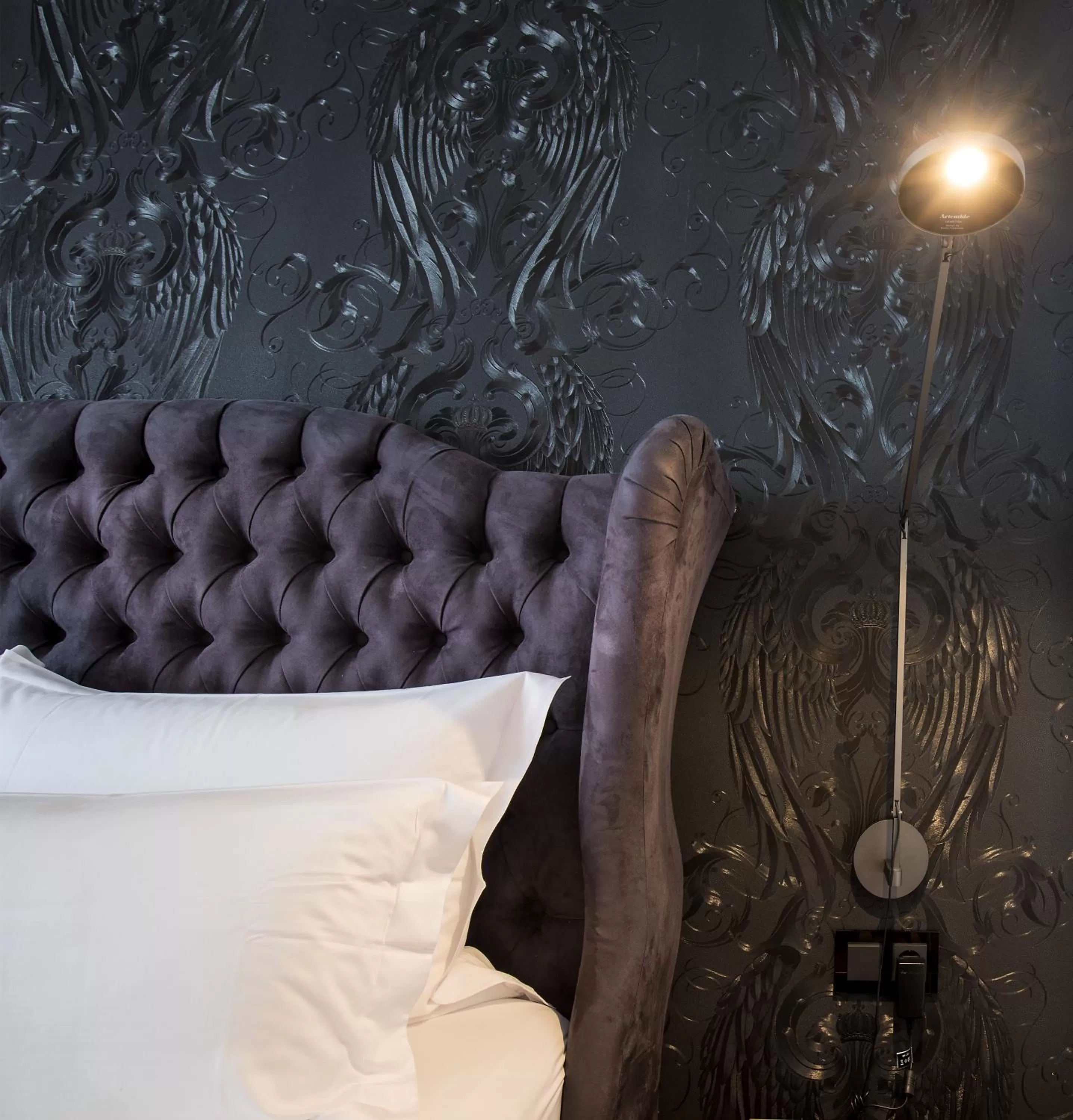 Bed in La Mansion Vi Vadi Hotel