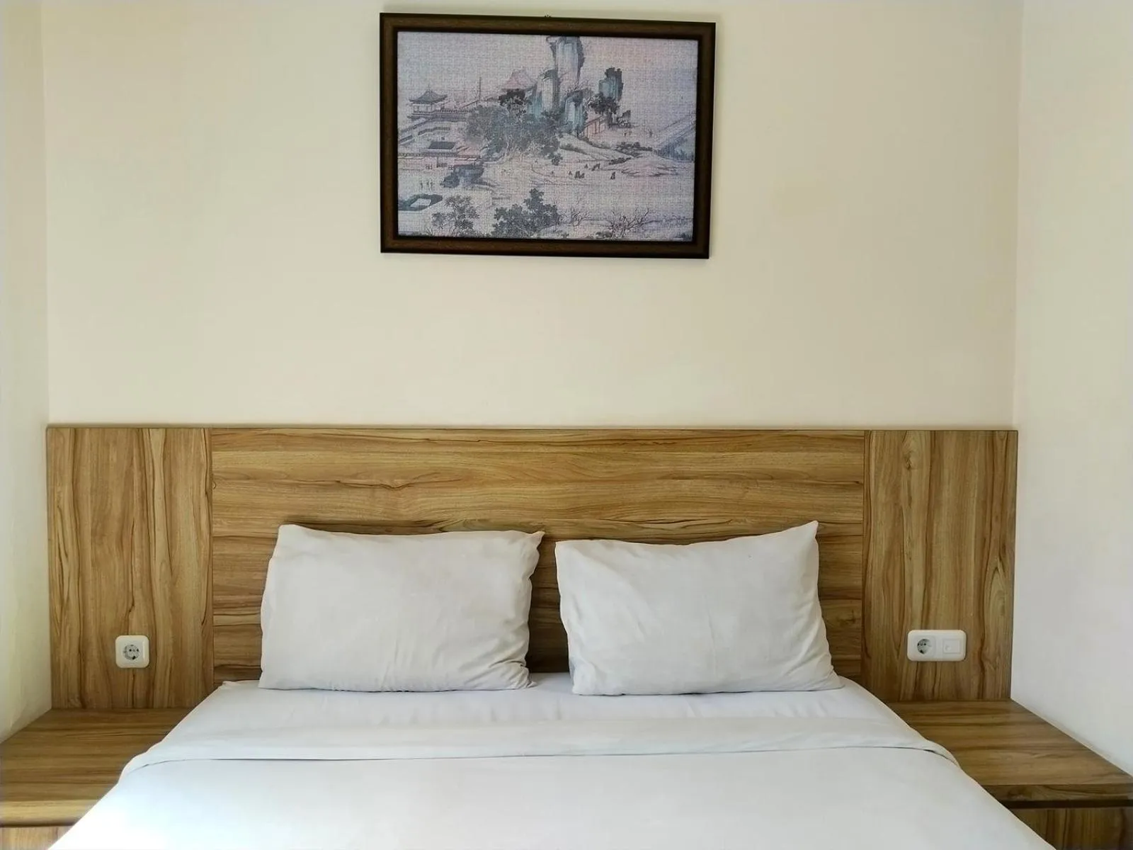 Bed in Portal Residence