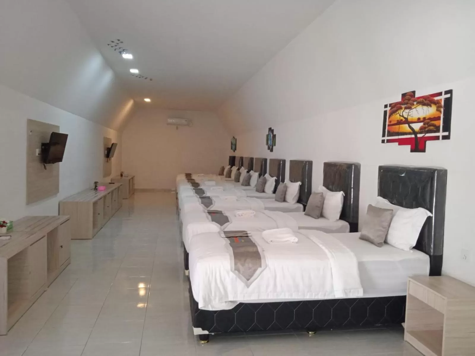 Bed in Madu Tiga Beach and Resort