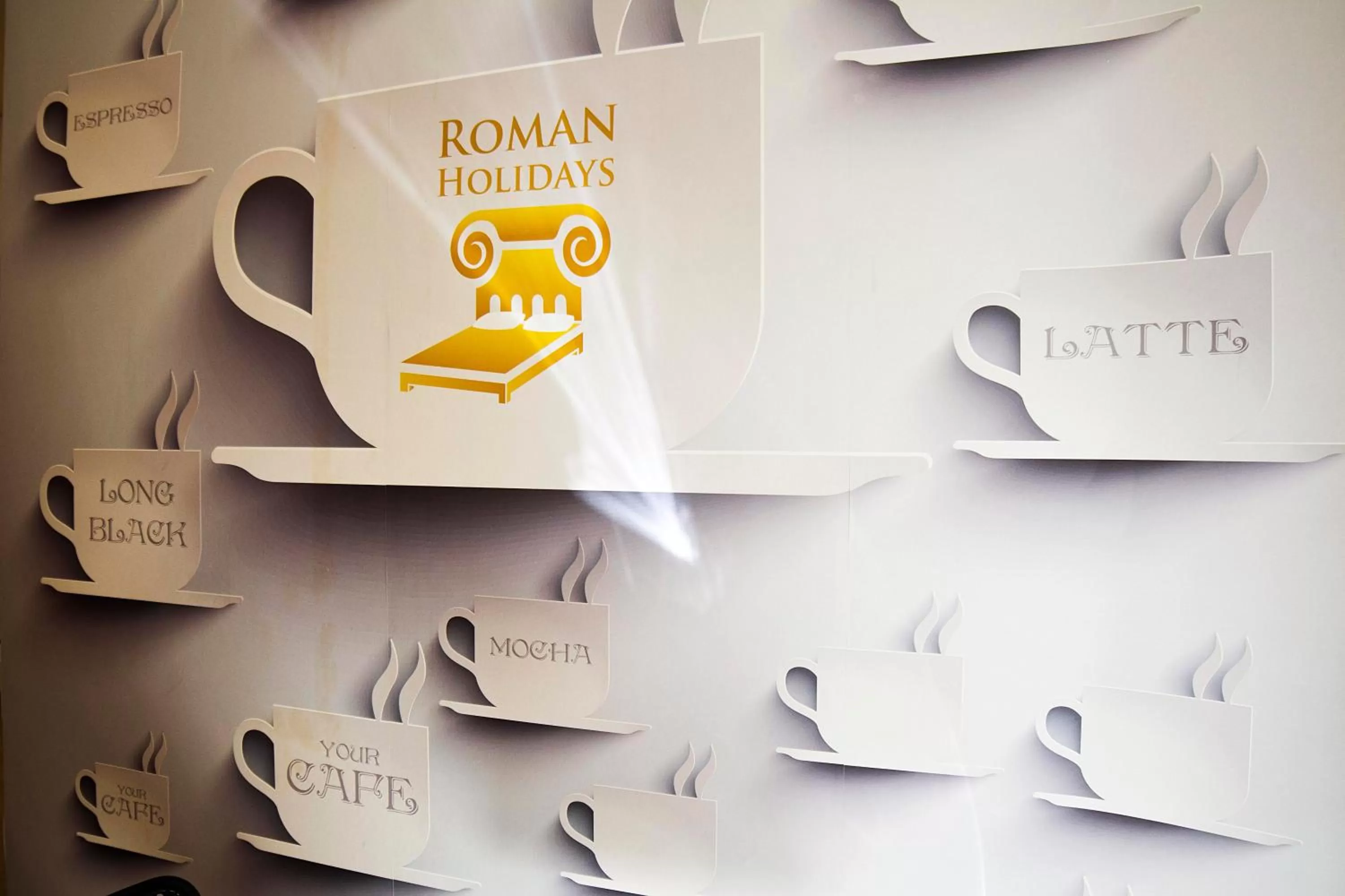 Property logo or sign in Roman Holidays Boutique Hotel