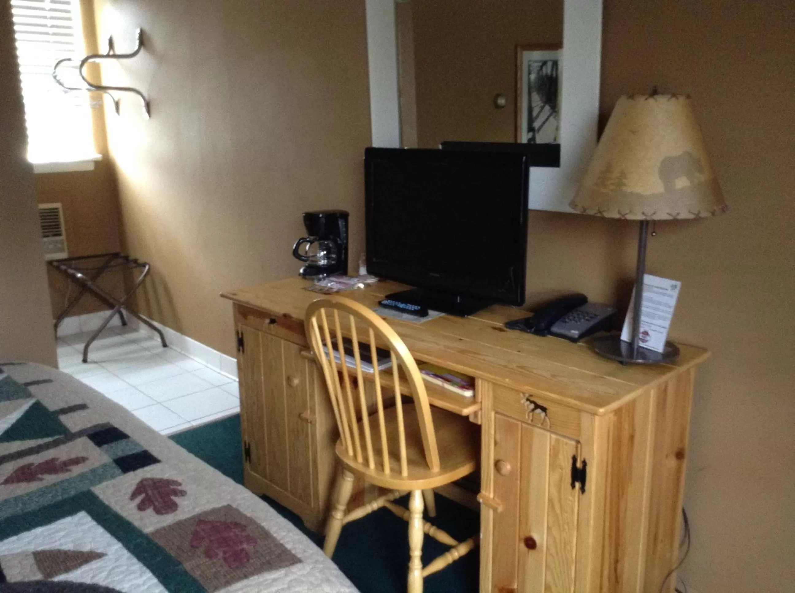 Decorative detail, TV/Entertainment Center in Willard Munger Inn