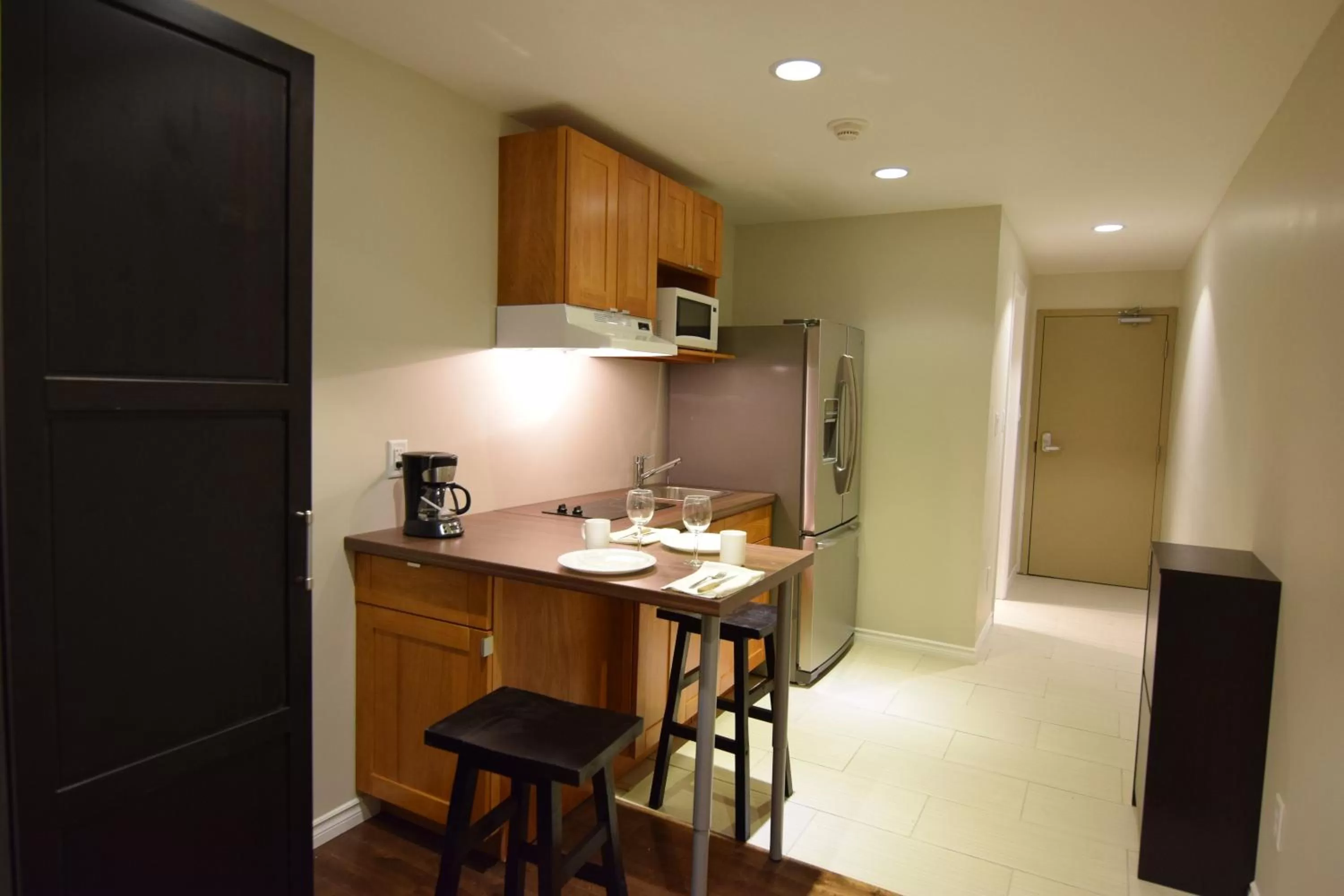 Kitchen or kitchenette in The Lion Inn & Suites
