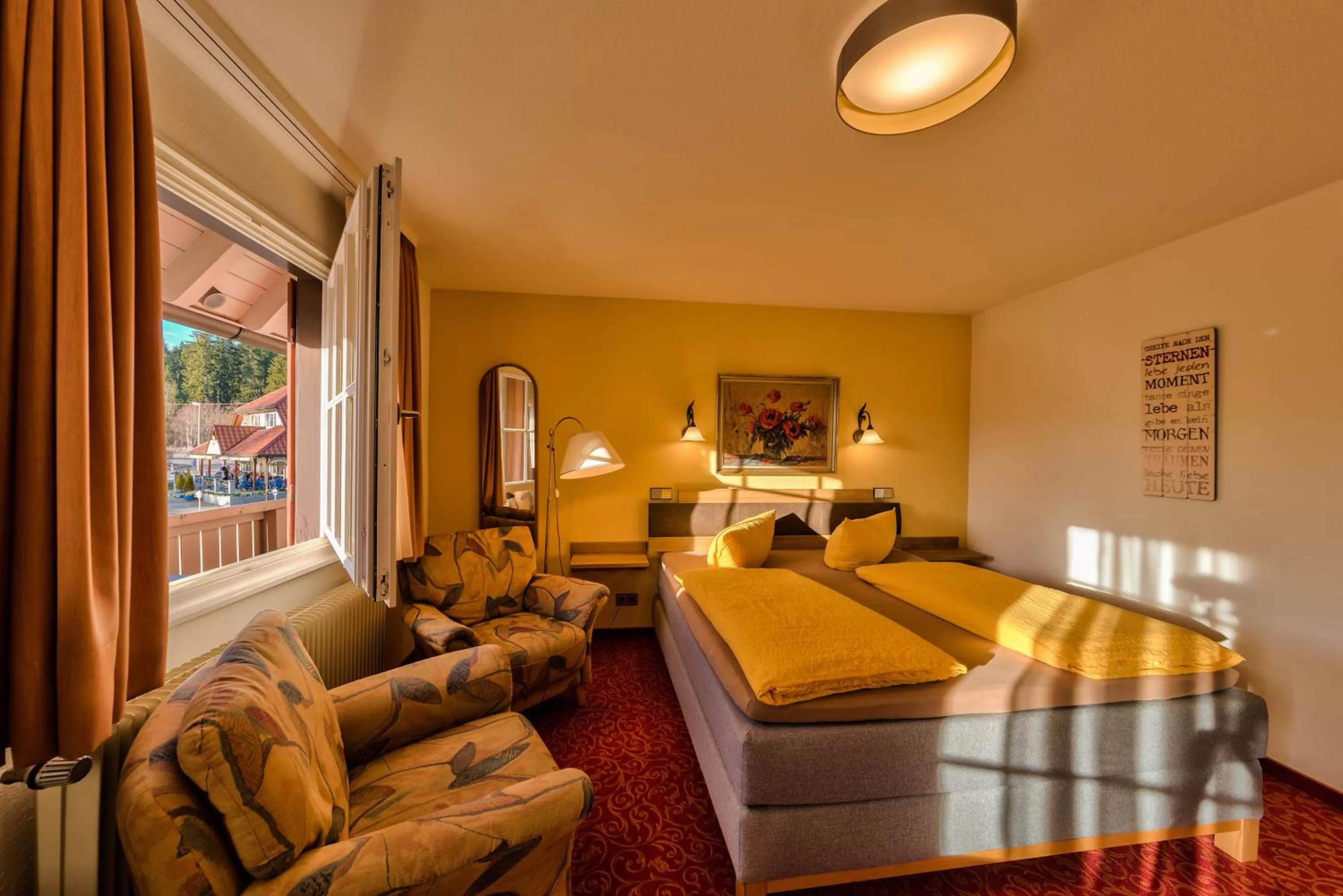 Photo of the whole room, Bed in Hotel Sonneneck Titisee -Adults Only-