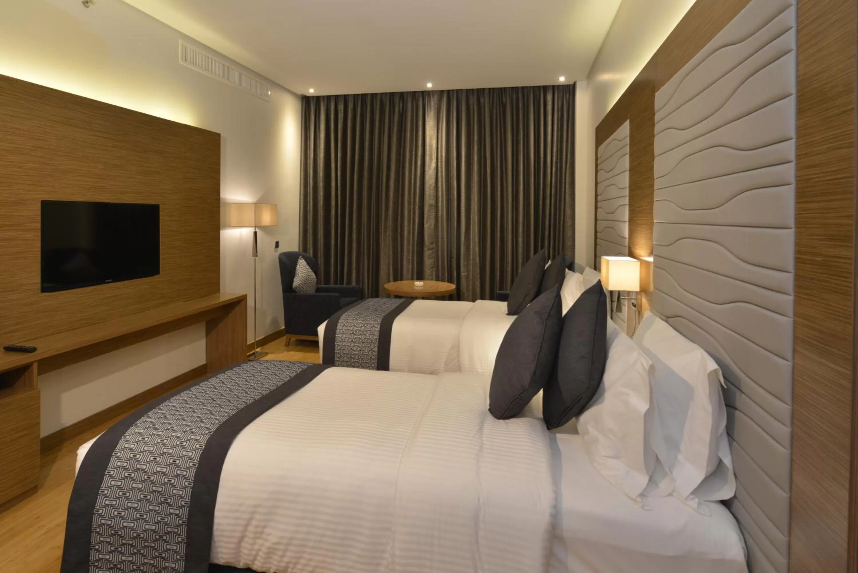 Shower, Bed in Ramada by Wyndham Manama City Centre