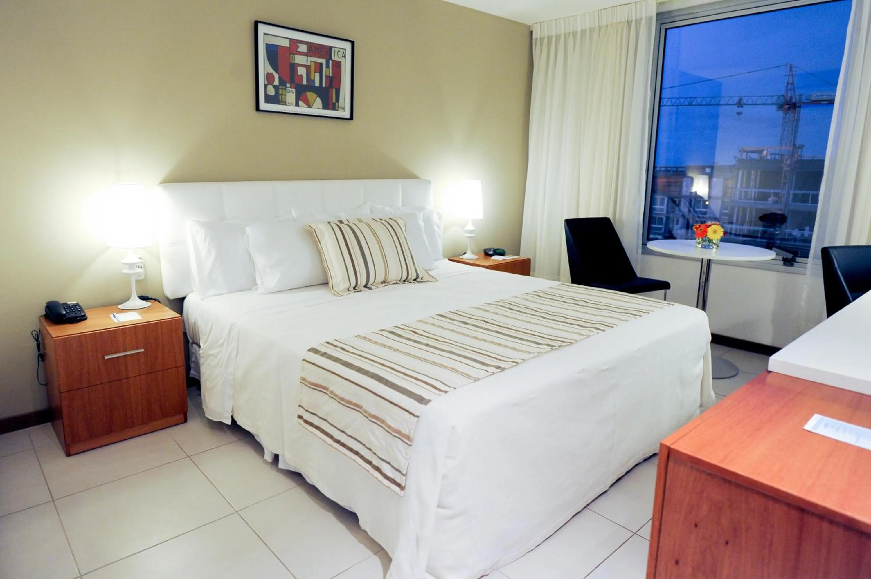 Bed in Real Colonia Hotel & Suites