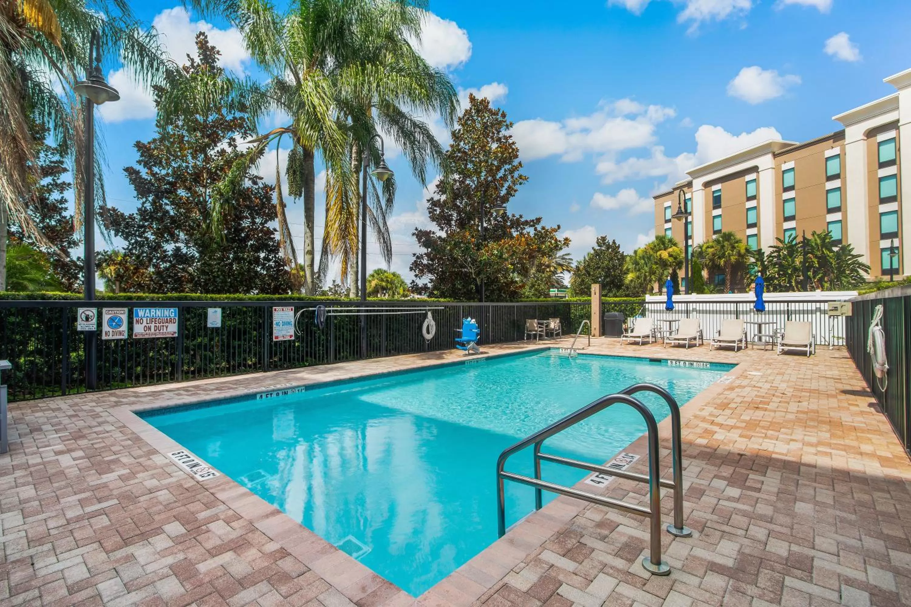 Swimming pool in Holiday Inn Express Hotel & Suites Orlando - Apopka, an IHG Hotel