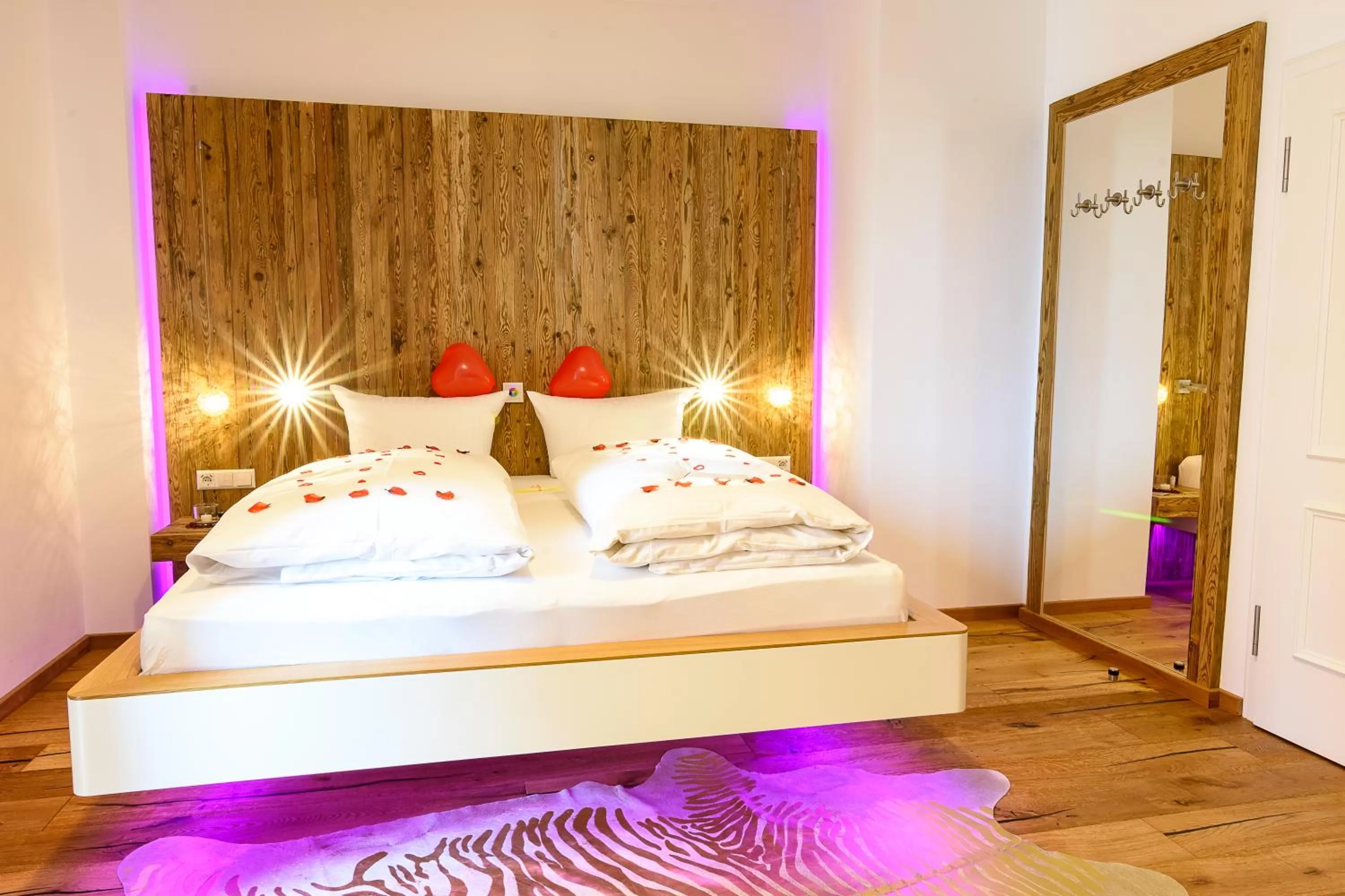 Photo of the whole room, Bed in YachtHotel Helvetia Spa- und Wellnessdomizil