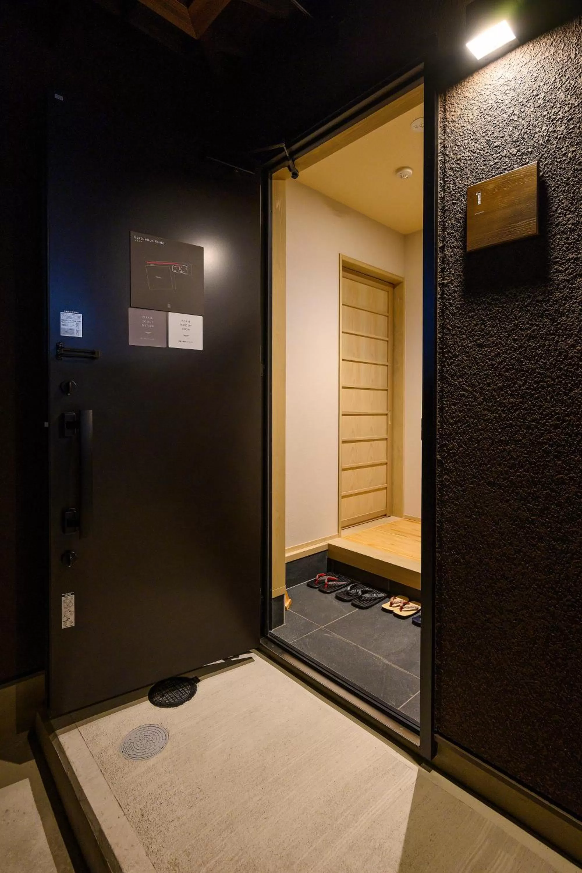 Facade/entrance, Bed in HOTEL WOOD TAKAYAMA