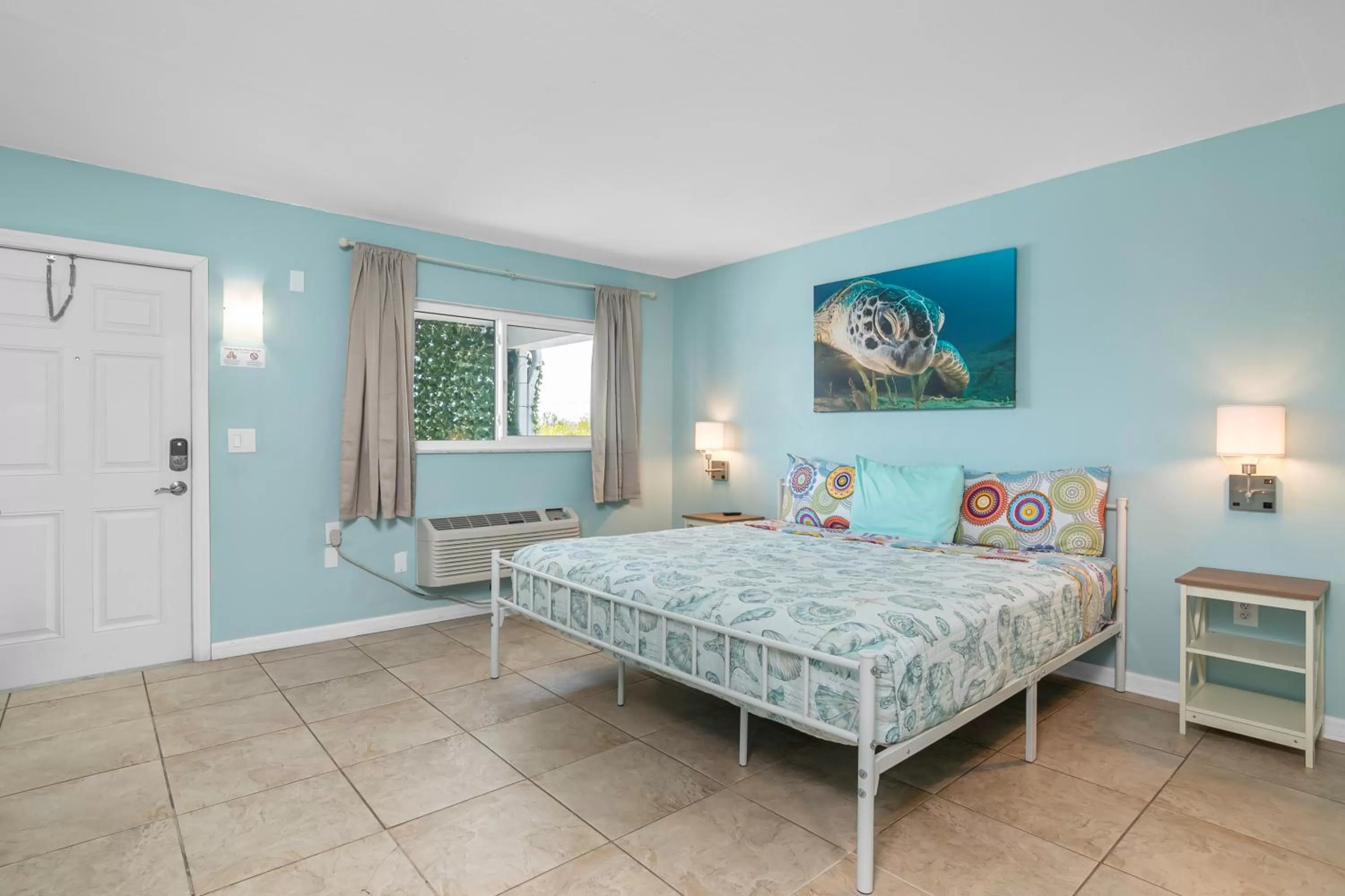 Bed in Latitude 26 Waterfront Resort and Marina