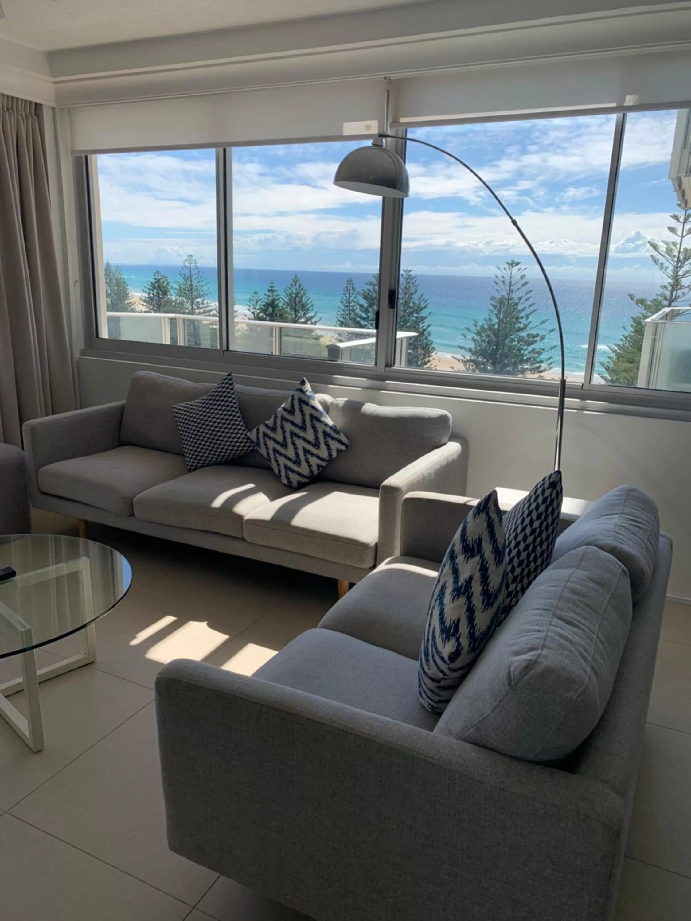 Living room in Pacific Regis Beachfront Holiday Apartments