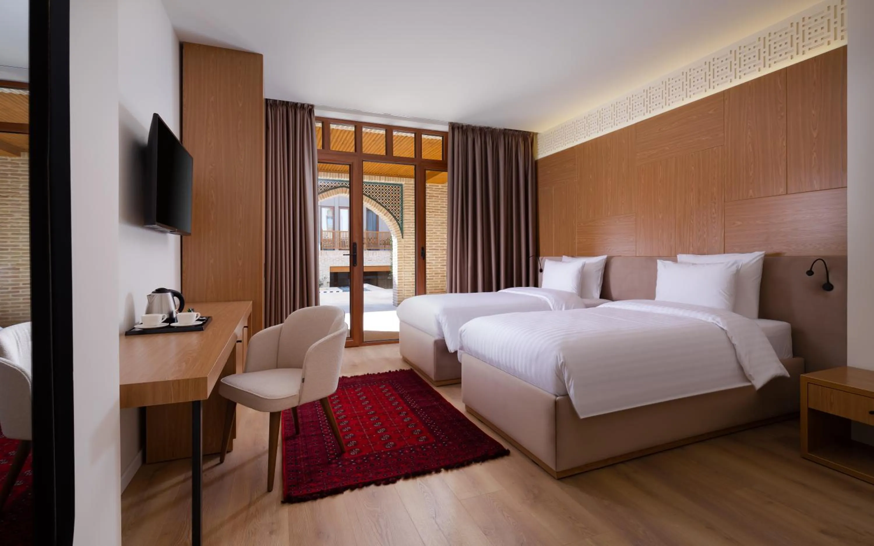 Communal lounge/ TV room, Bed in Mercure Bukhara Old Town