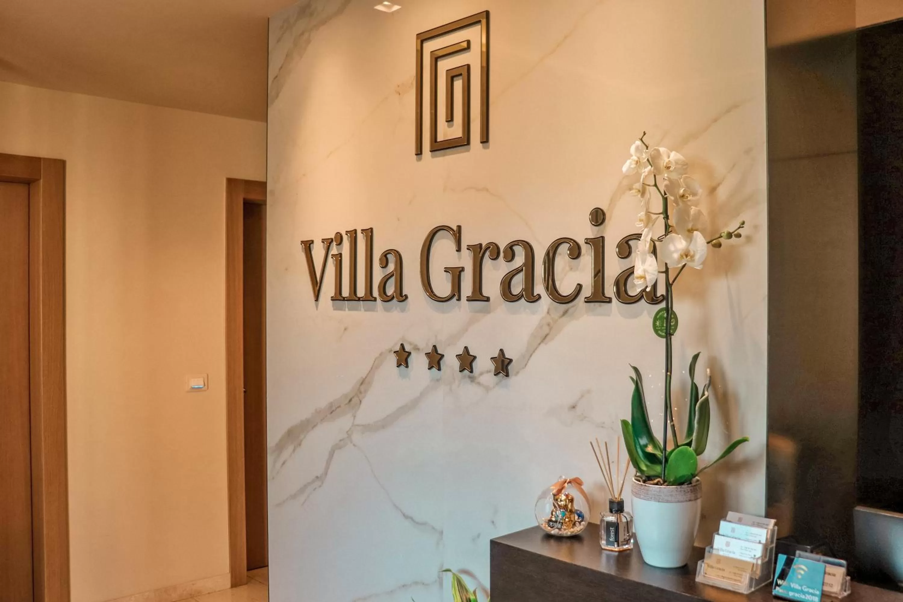 Property logo or sign in Hotel Villa Gracia