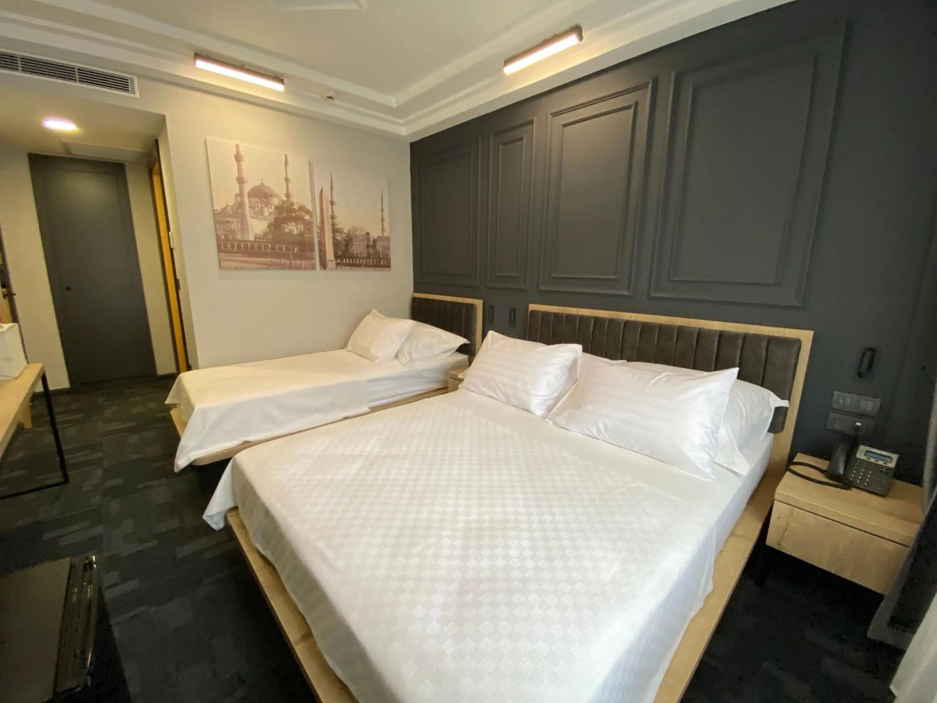 Bed in RW BOUTIQUE HOTEL