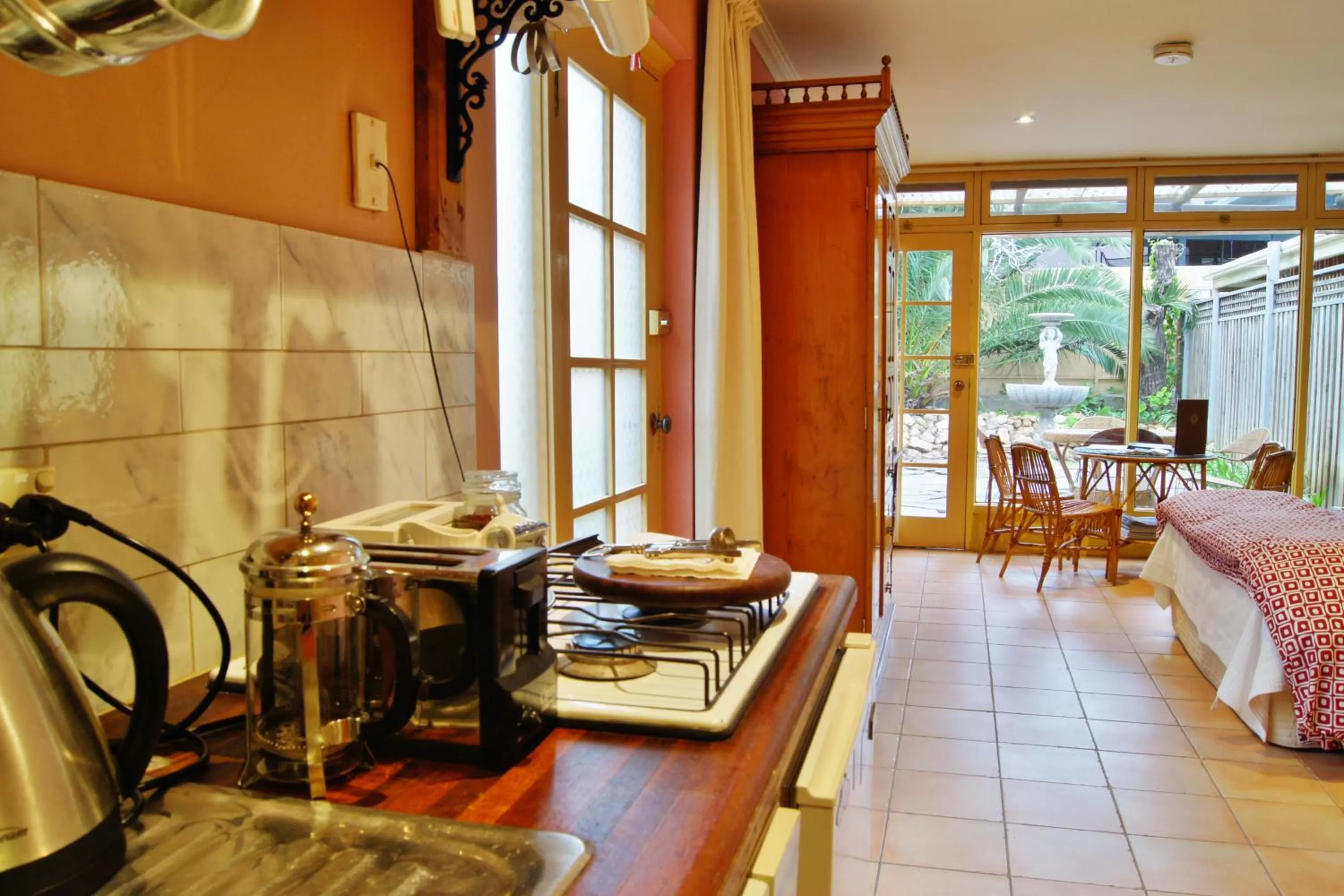 Kitchen or kitchenette in North Adelaide Heritage Cottages & Apartments
