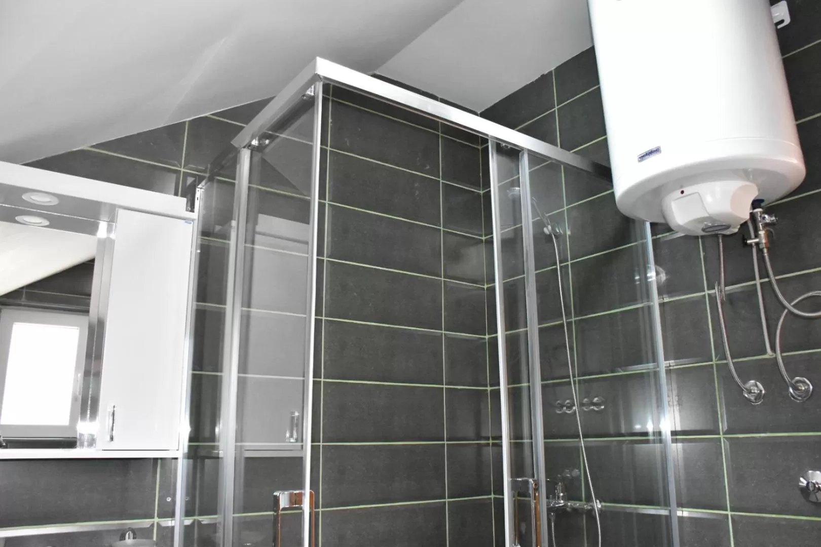 Bathroom in OSTROG Aparthotel KOLIBA-VLASTNIŠTVO MANASTIRA OSTROG