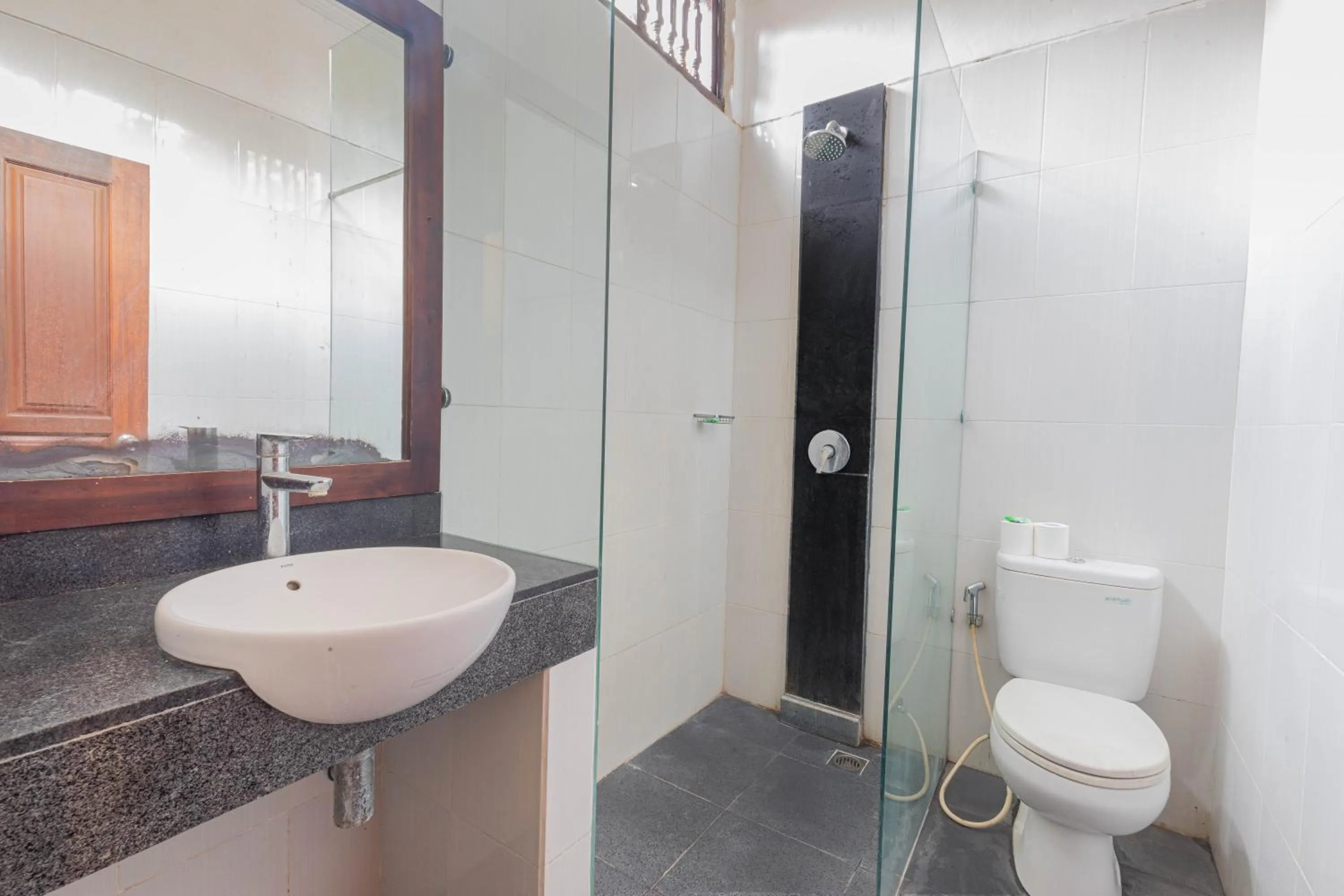 Bathroom in Puri Mango Guest House Sanur