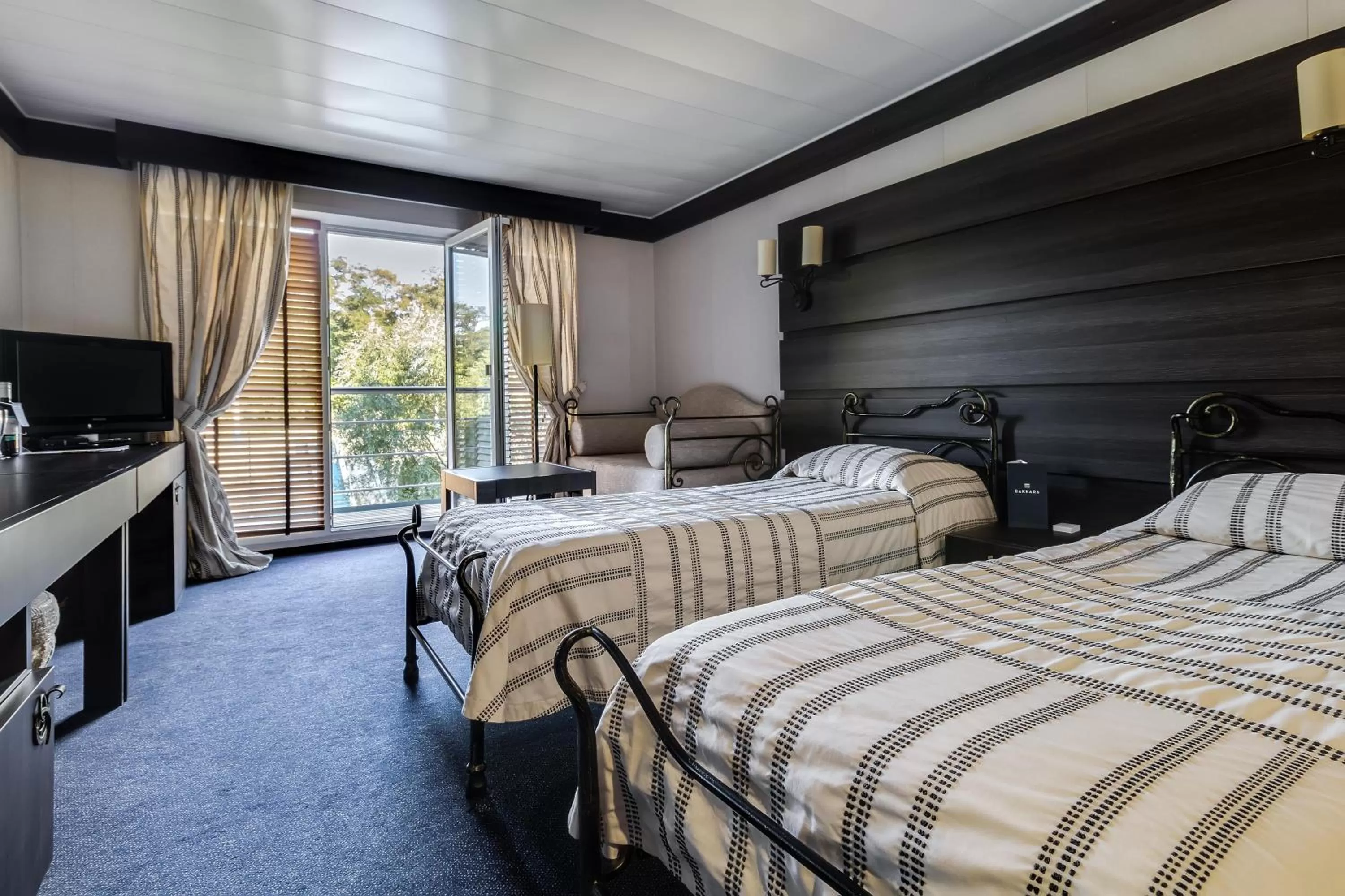 Bed in Bakkara Hotel