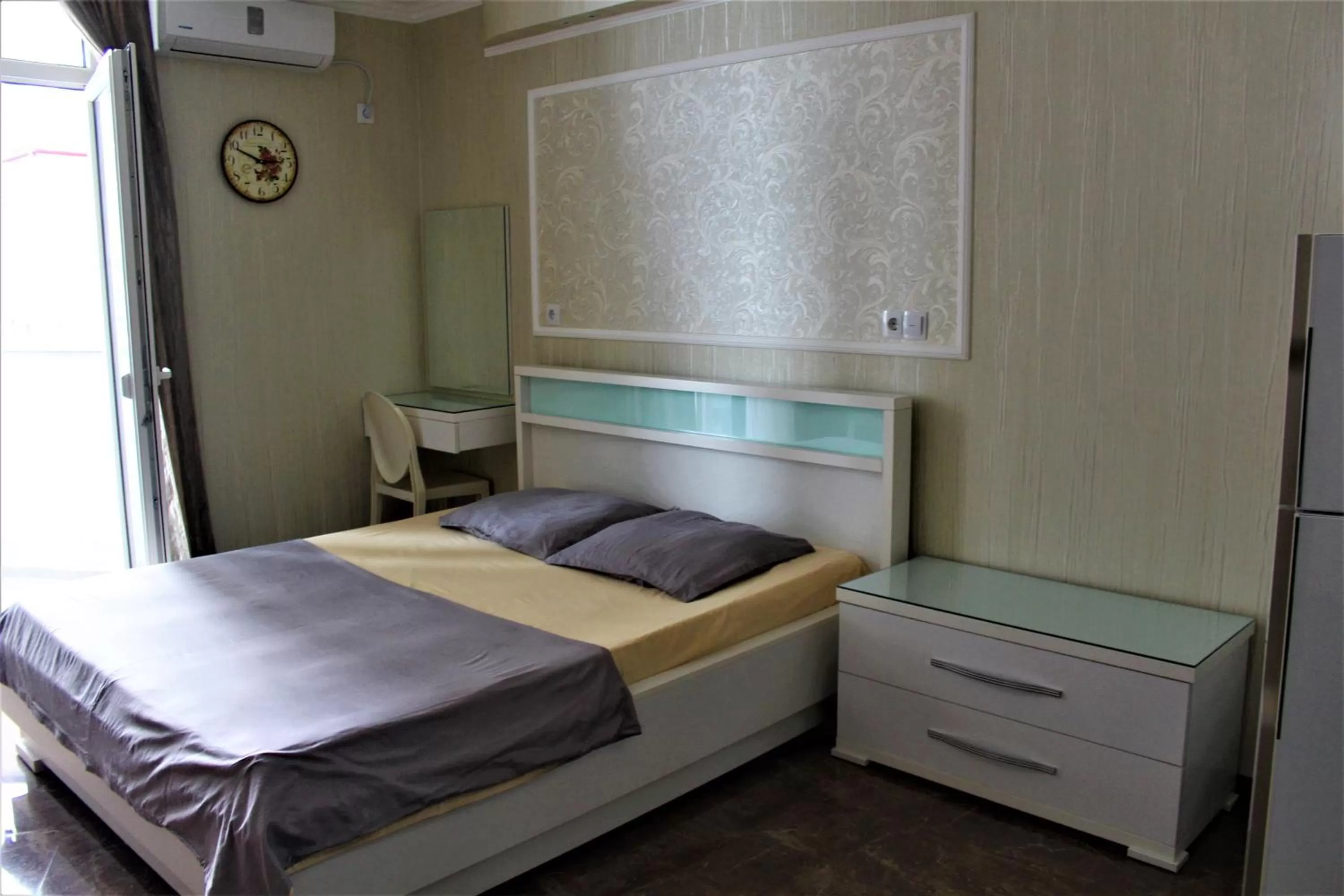Bed in Orbi Lux Apartment